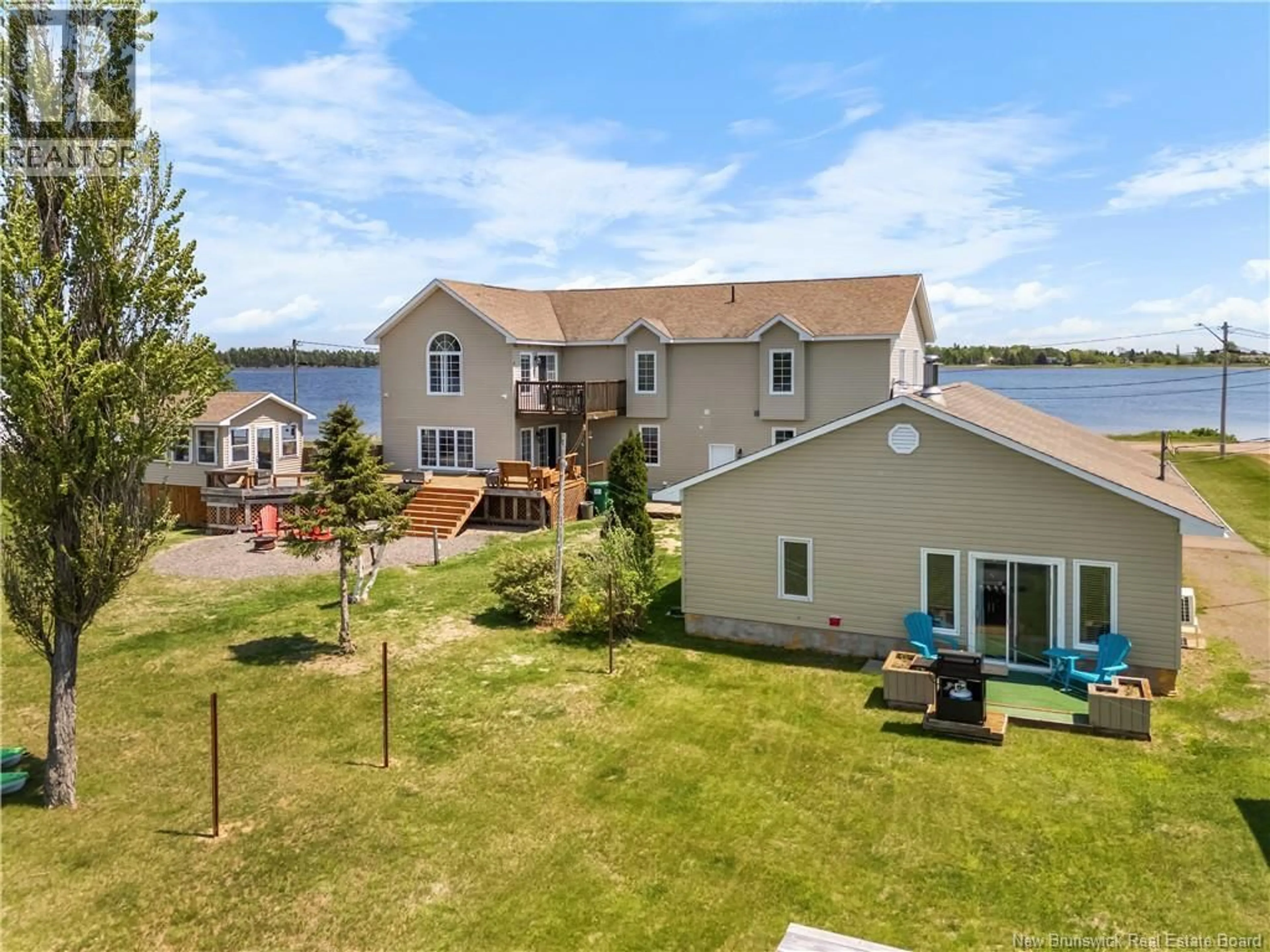 A pic from outside/outdoor area/front of a property/back of a property/a pic from drone, water/lake/river/ocean view for 79 POINTE DU MIRAGE, Aldouane New Brunswick E4W5C7