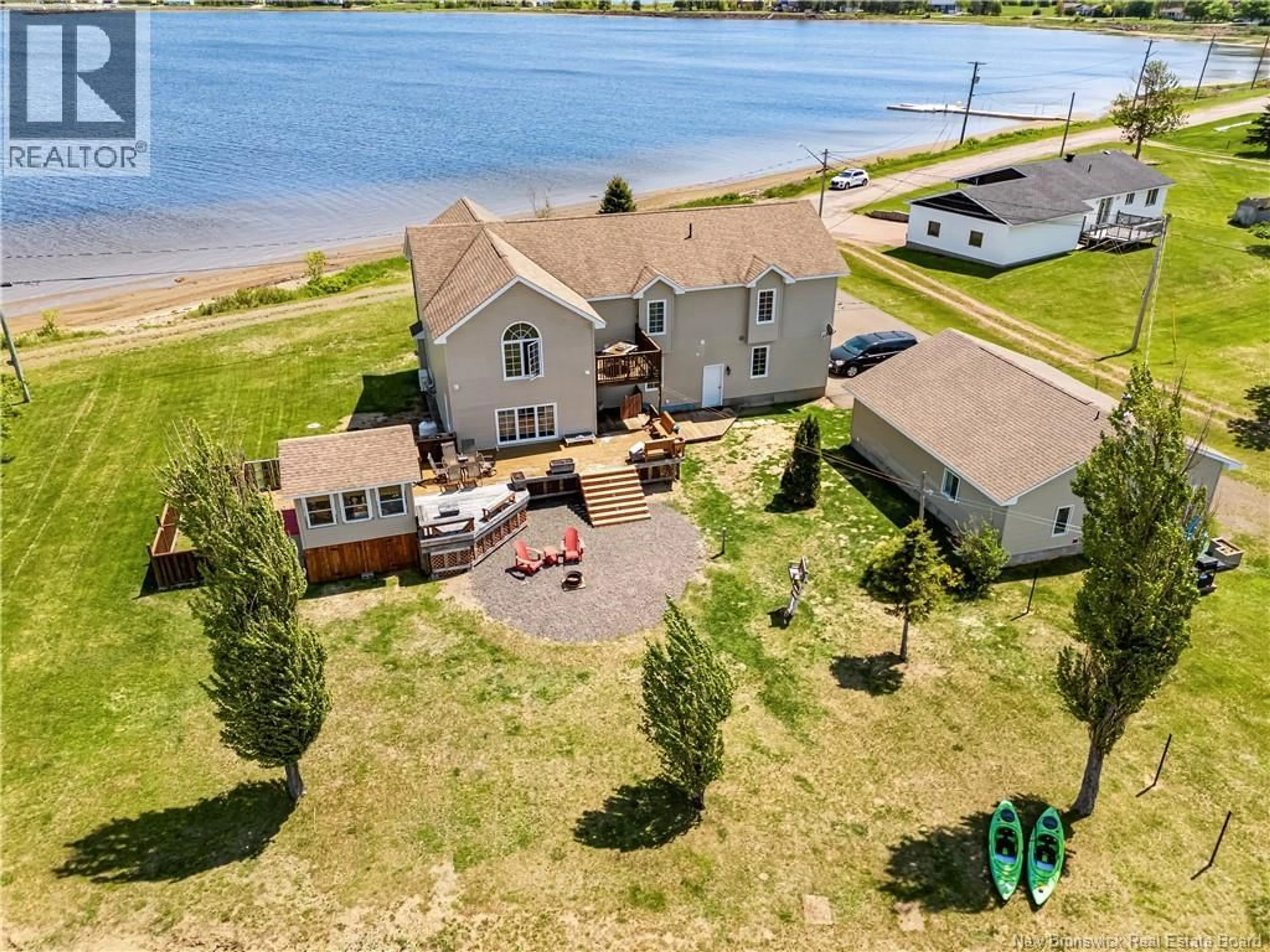 A pic from outside/outdoor area/front of a property/back of a property/a pic from drone, water/lake/river/ocean view for 79 POINTE DU MIRAGE, Aldouane New Brunswick E4W5C7