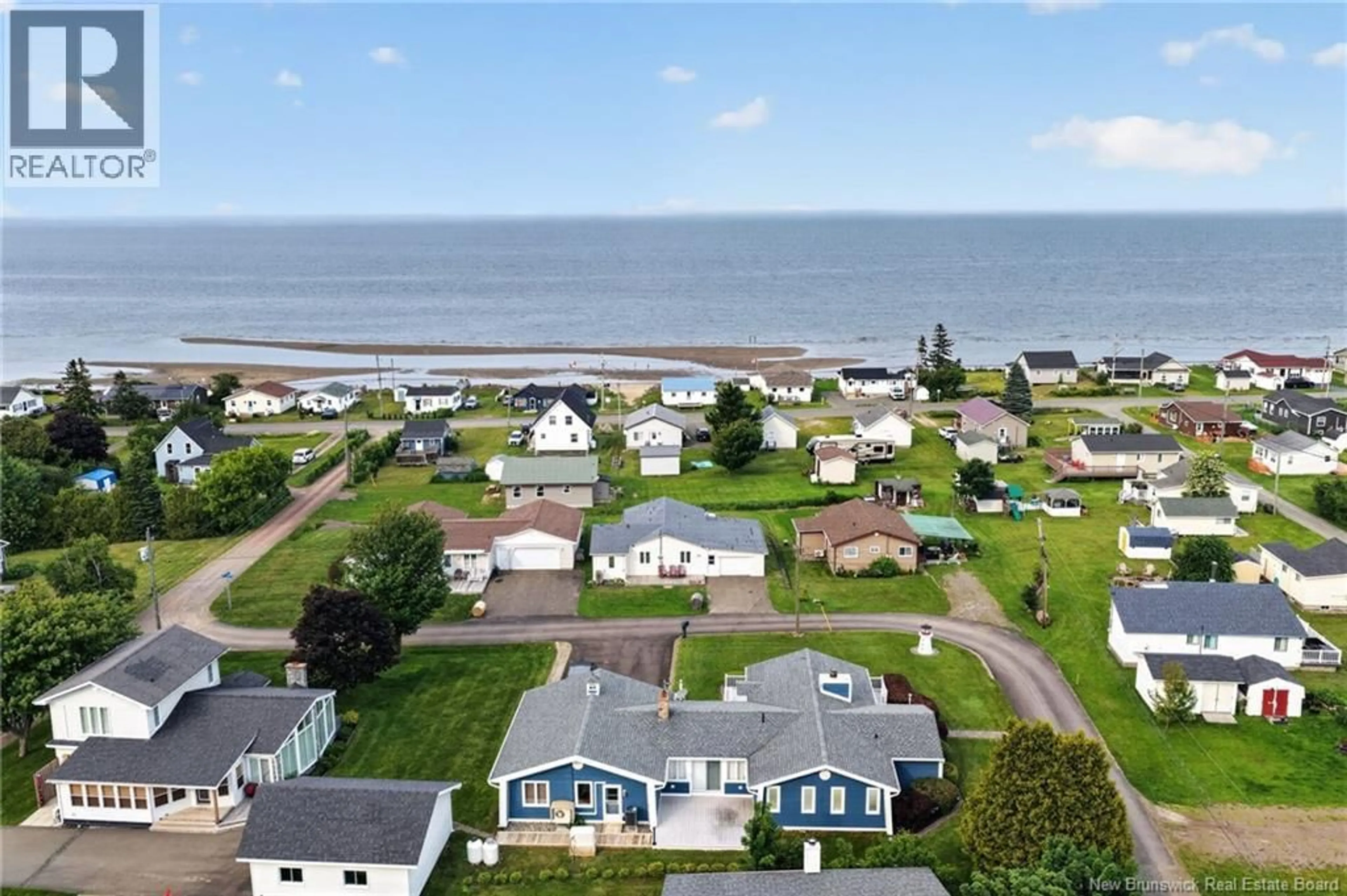 A pic from outside/outdoor area/front of a property/back of a property/a pic from drone, water/lake/river/ocean view for 79 SUNSHINE DRIVE, Grande-Digue New Brunswick E4R5T7