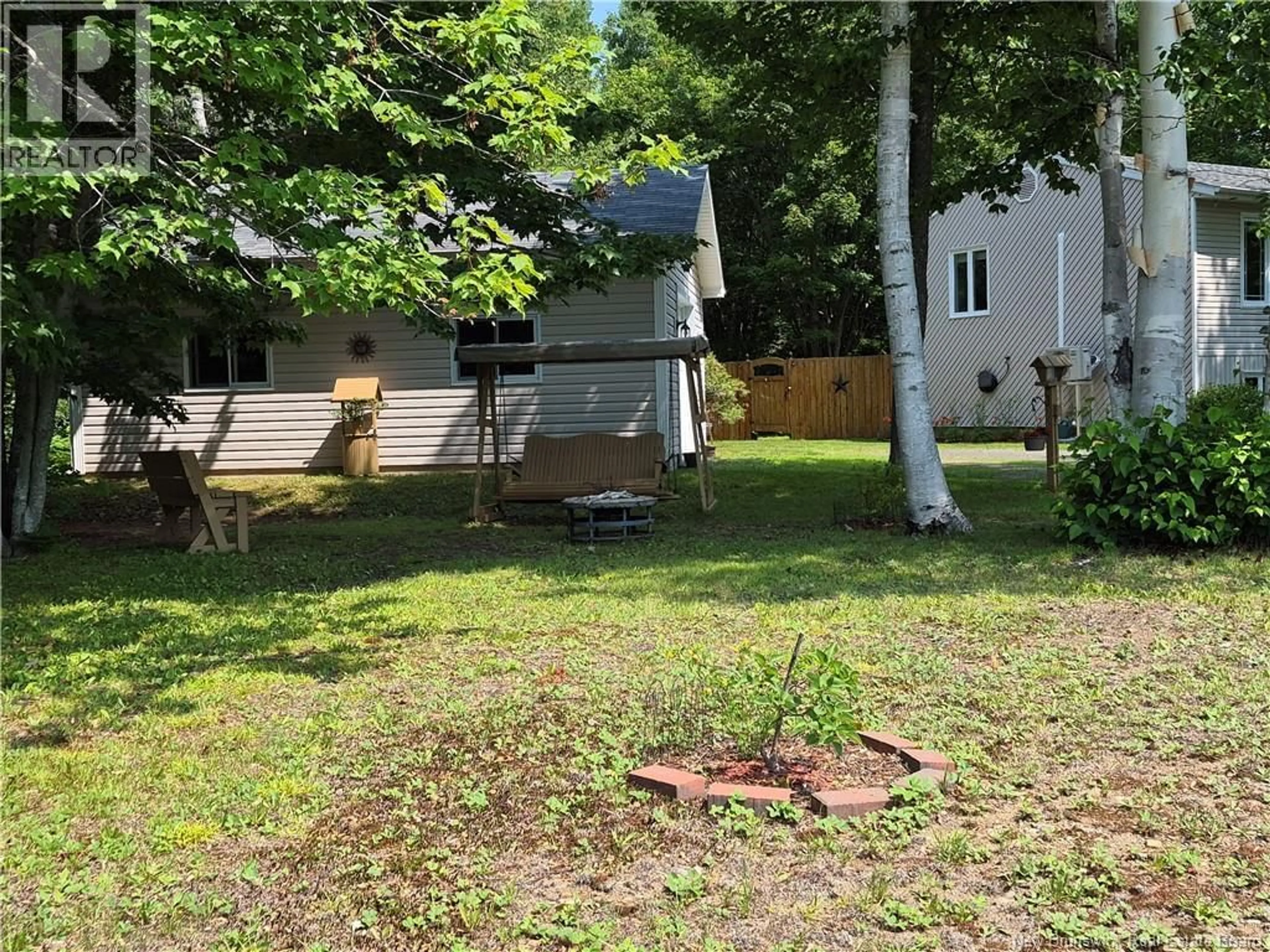 A pic from outside/outdoor area/front of a property/back of a property/a pic from drone, unknown for 116 RUE FRENETTE, Nigadoo New Brunswick E8K3V7
