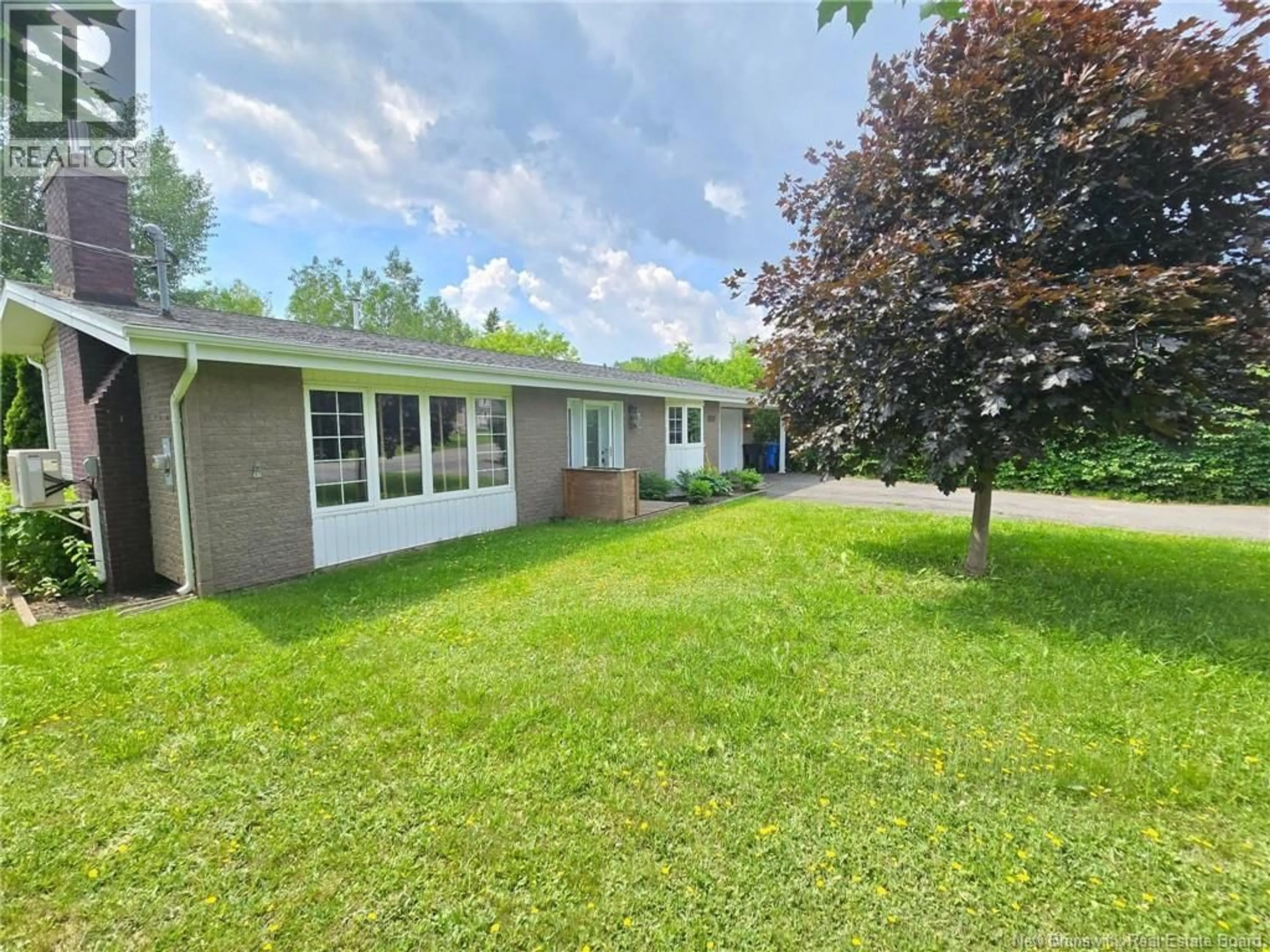 A pic from outside/outdoor area/front of a property/back of a property/a pic from drone, unknown for 735 ASSUMPTION, Bathurst New Brunswick E2A2V6