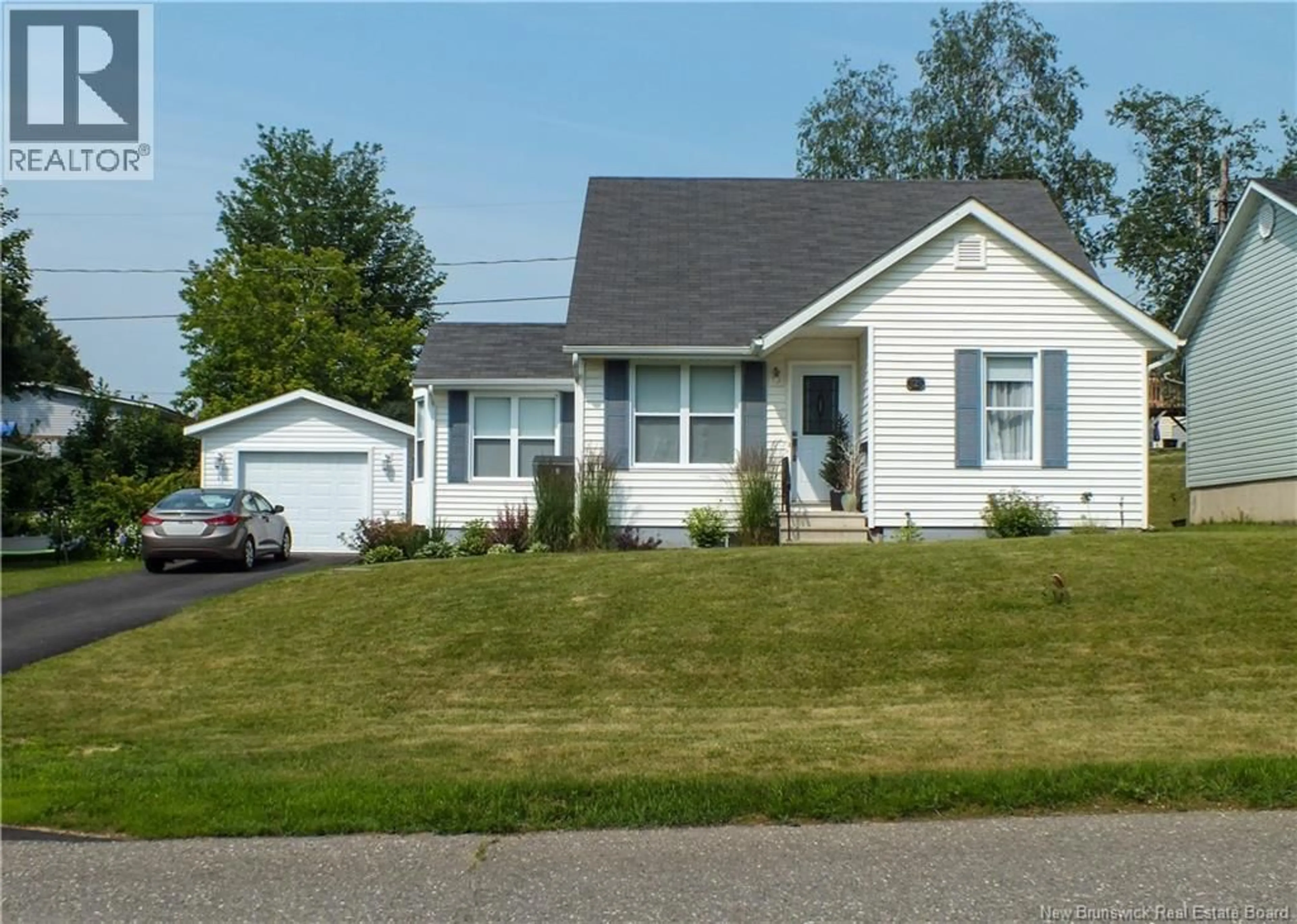 Home with vinyl exterior material, street for 121 CREIGHTON STREET, Woodstock New Brunswick E7M1N4