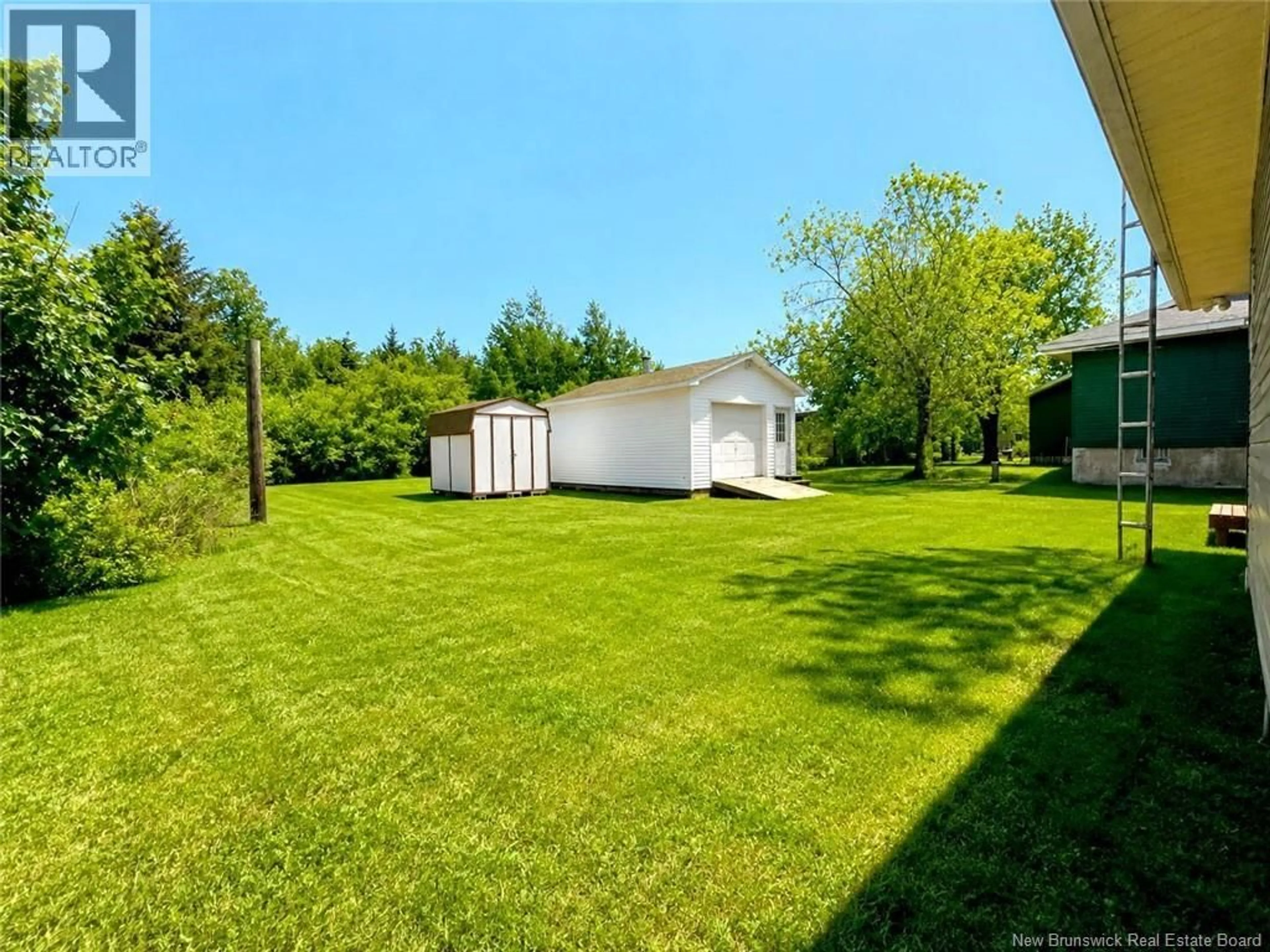 A pic from outside/outdoor area/front of a property/back of a property/a pic from drone, unknown for 88 RUE DONAT, Pointe-Des-Robichaud New Brunswick E1X4C4