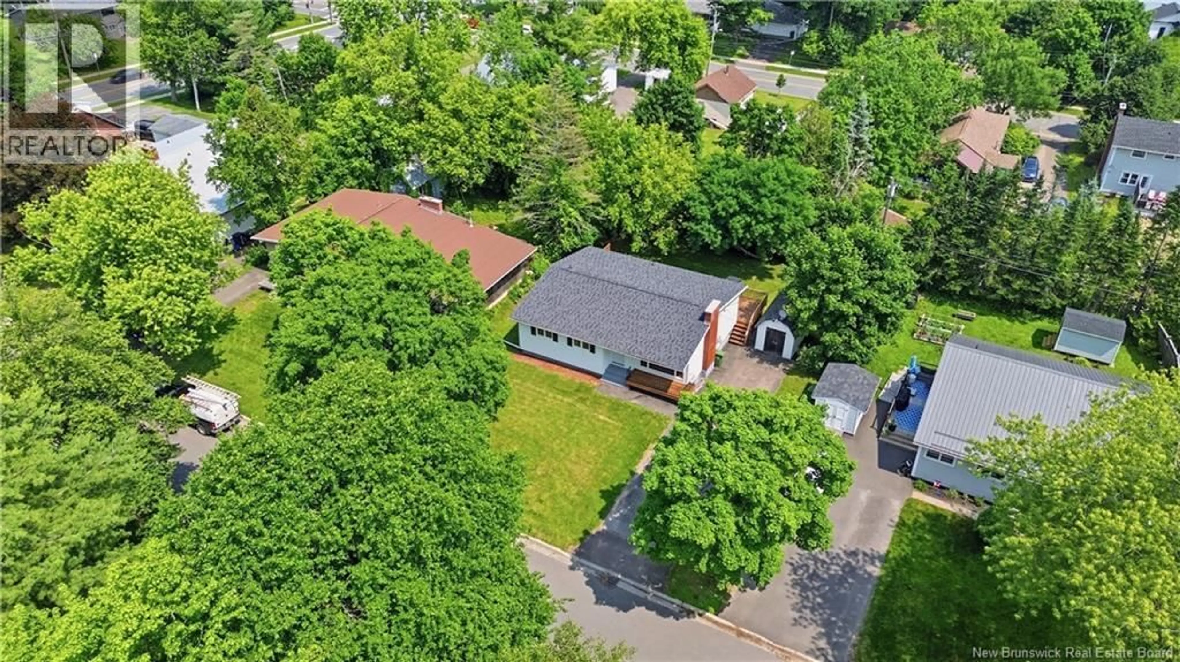 A pic from outside/outdoor area/front of a property/back of a property/a pic from drone, street for 447 PEDERSON CRESCENT, Fredericton New Brunswick E3B2Z1