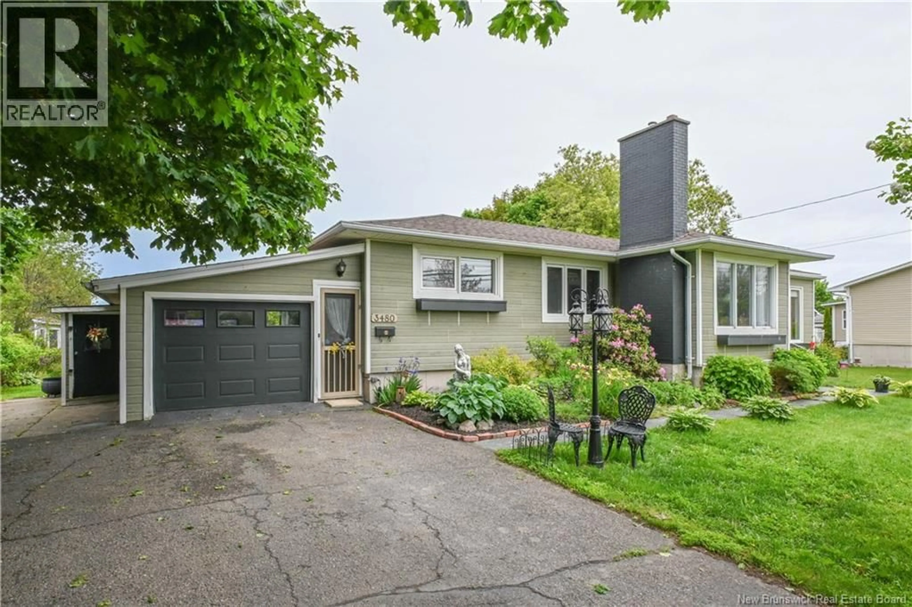 Home with vinyl exterior material, street for 3480 CENTENAIRE STREET, Tracadie New Brunswick E1X1A7
