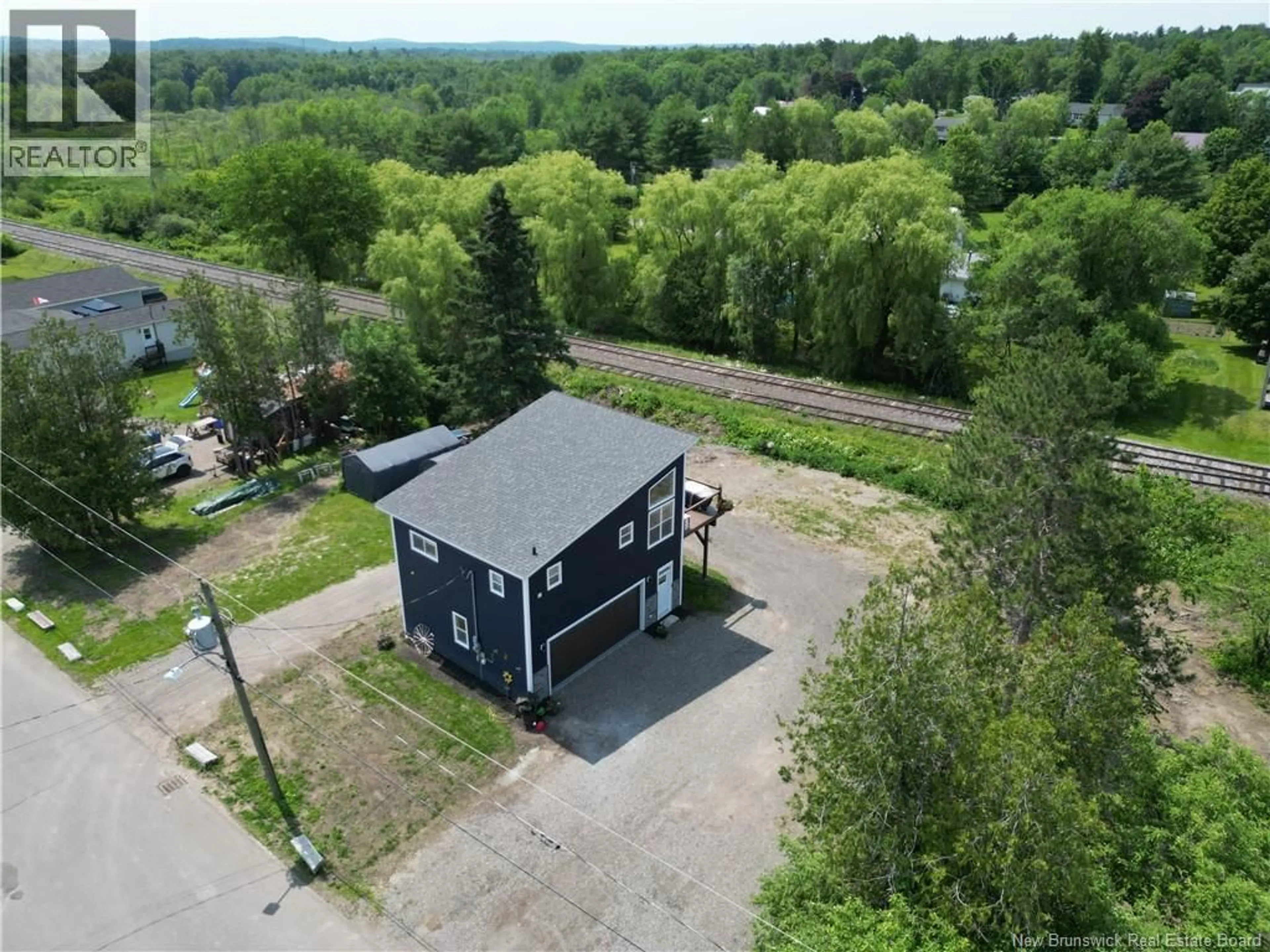 A pic from outside/outdoor area/front of a property/back of a property/a pic from drone, unknown for 66 RIVERSIDE DRIVE, St. Stephen New Brunswick E3L1C2