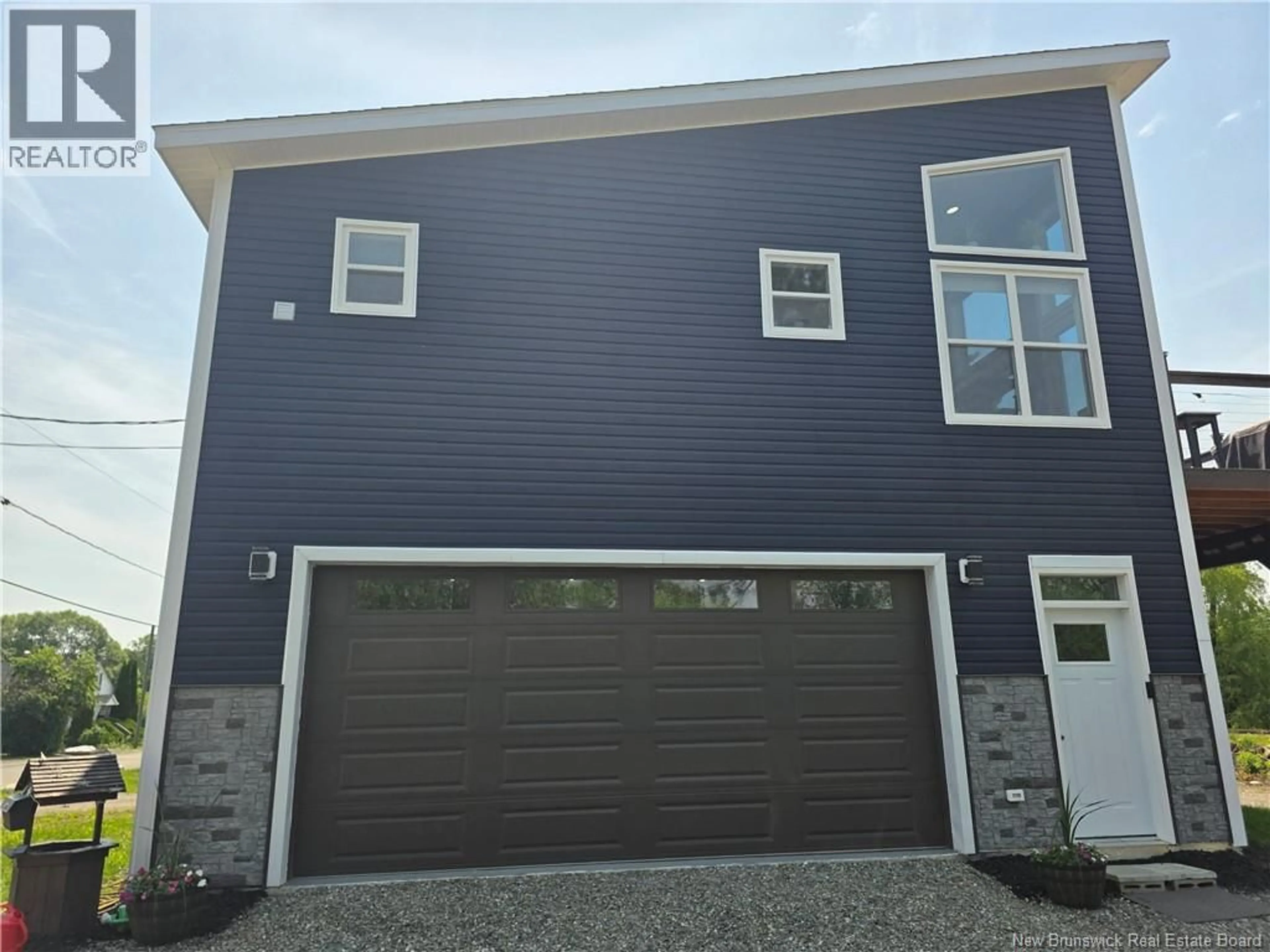 Home with vinyl exterior material, street for 66 RIVERSIDE DRIVE, St. Stephen New Brunswick E3L1C2