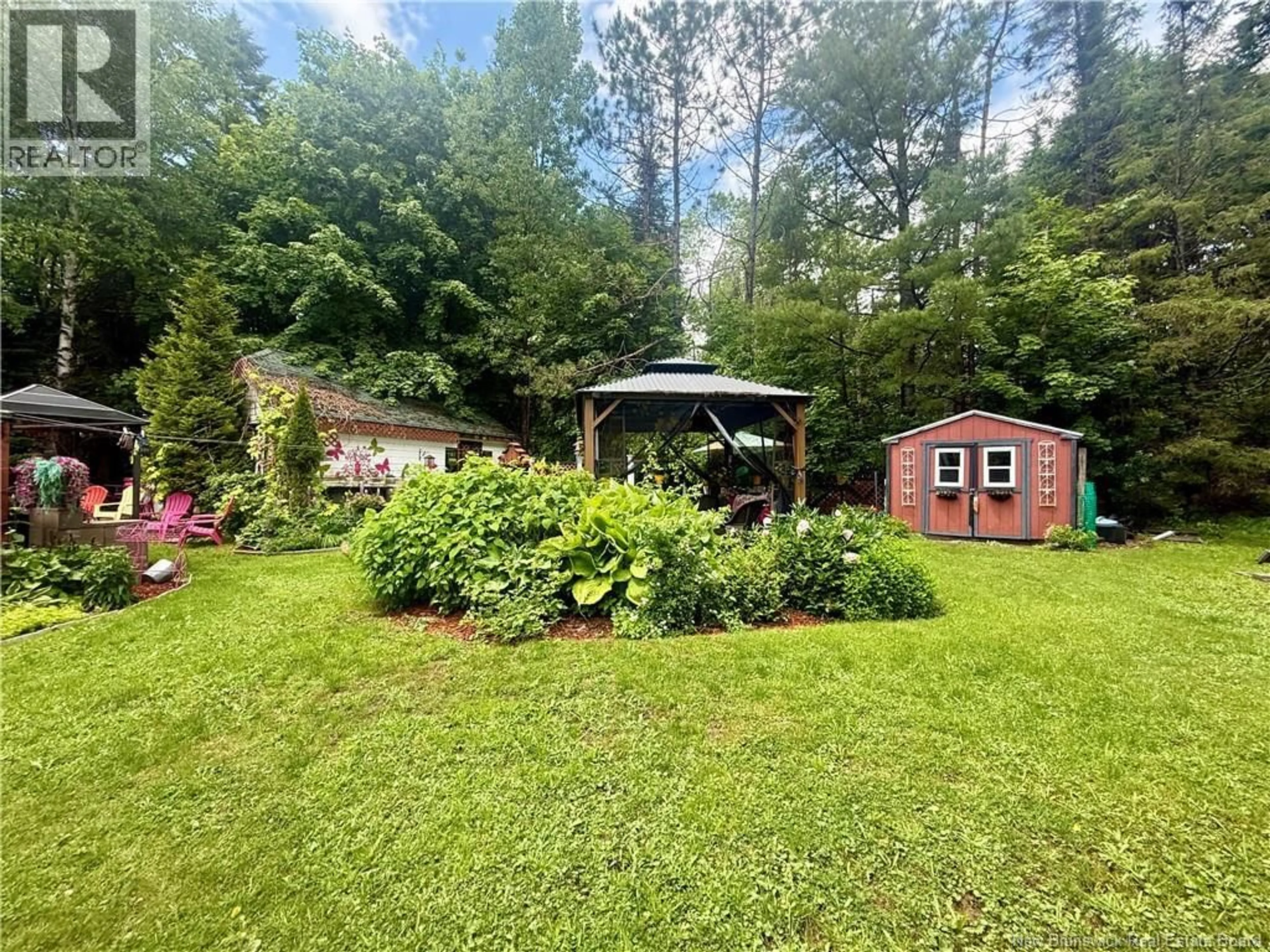 A pic from outside/outdoor area/front of a property/back of a property/a pic from drone, unknown for 97 MAIN STREET, St George New Brunswick E5C3J6