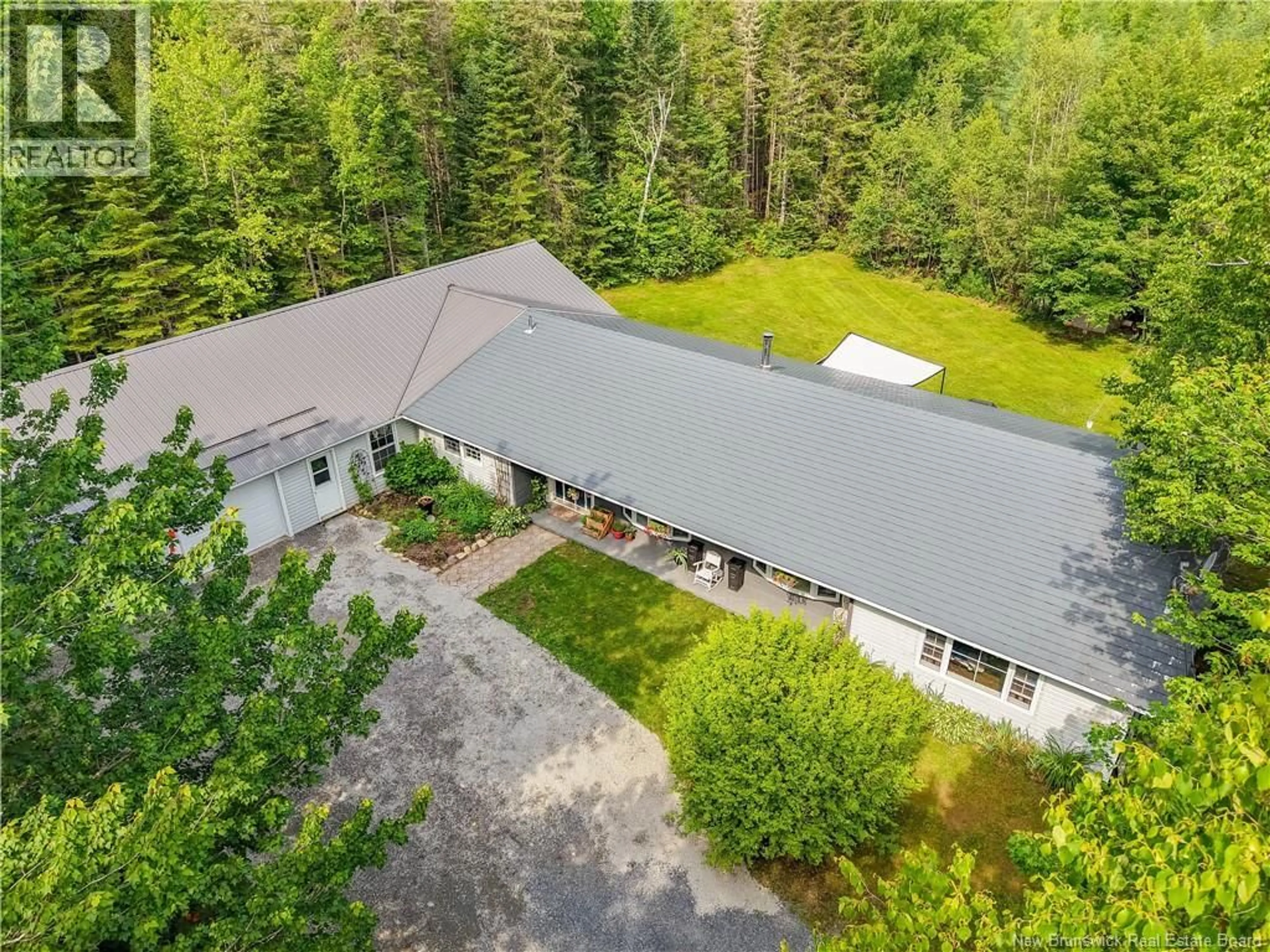 A pic from outside/outdoor area/front of a property/back of a property/a pic from drone, forest/trees view for 2428 ROUTE 101, Beaver Dam New Brunswick E3B7V3