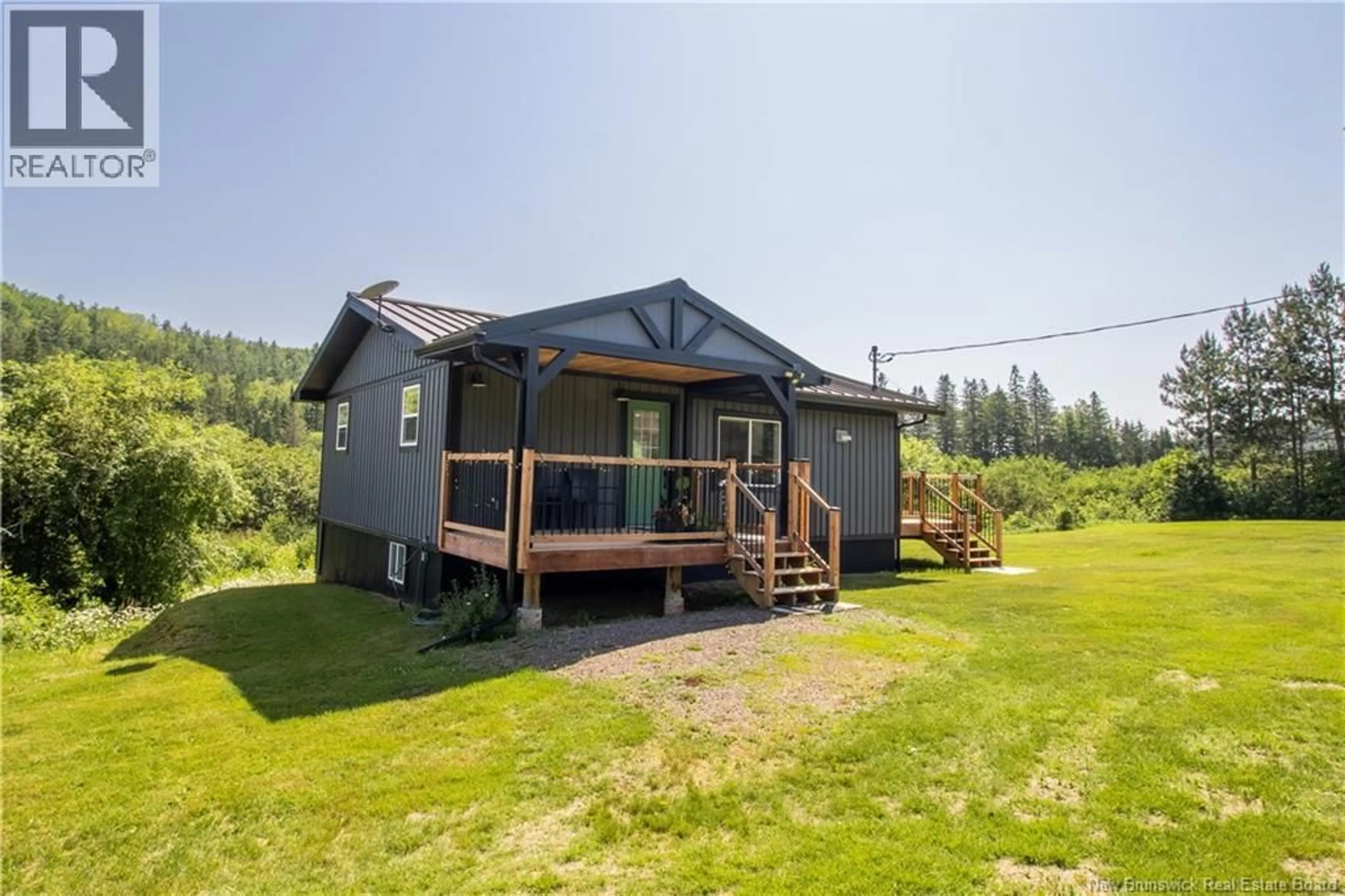 A pic from outside/outdoor area/front of a property/back of a property/a pic from drone, water/lake/river/ocean view for 11464 ROUTE 114, South Branch New Brunswick E4E5G1