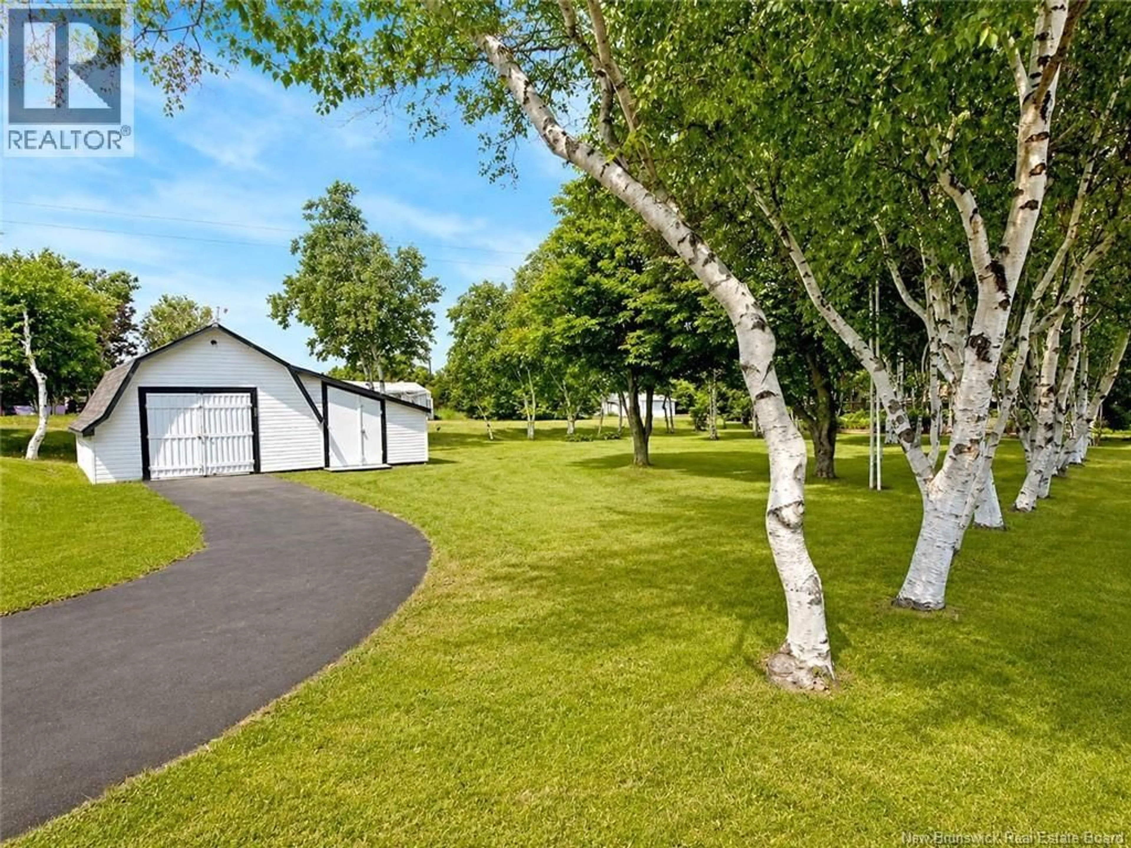 A pic from outside/outdoor area/front of a property/back of a property/a pic from drone, forest/trees view for 171 LOUIS DE LANTEIGNE, Caraquet New Brunswick E1W1B3