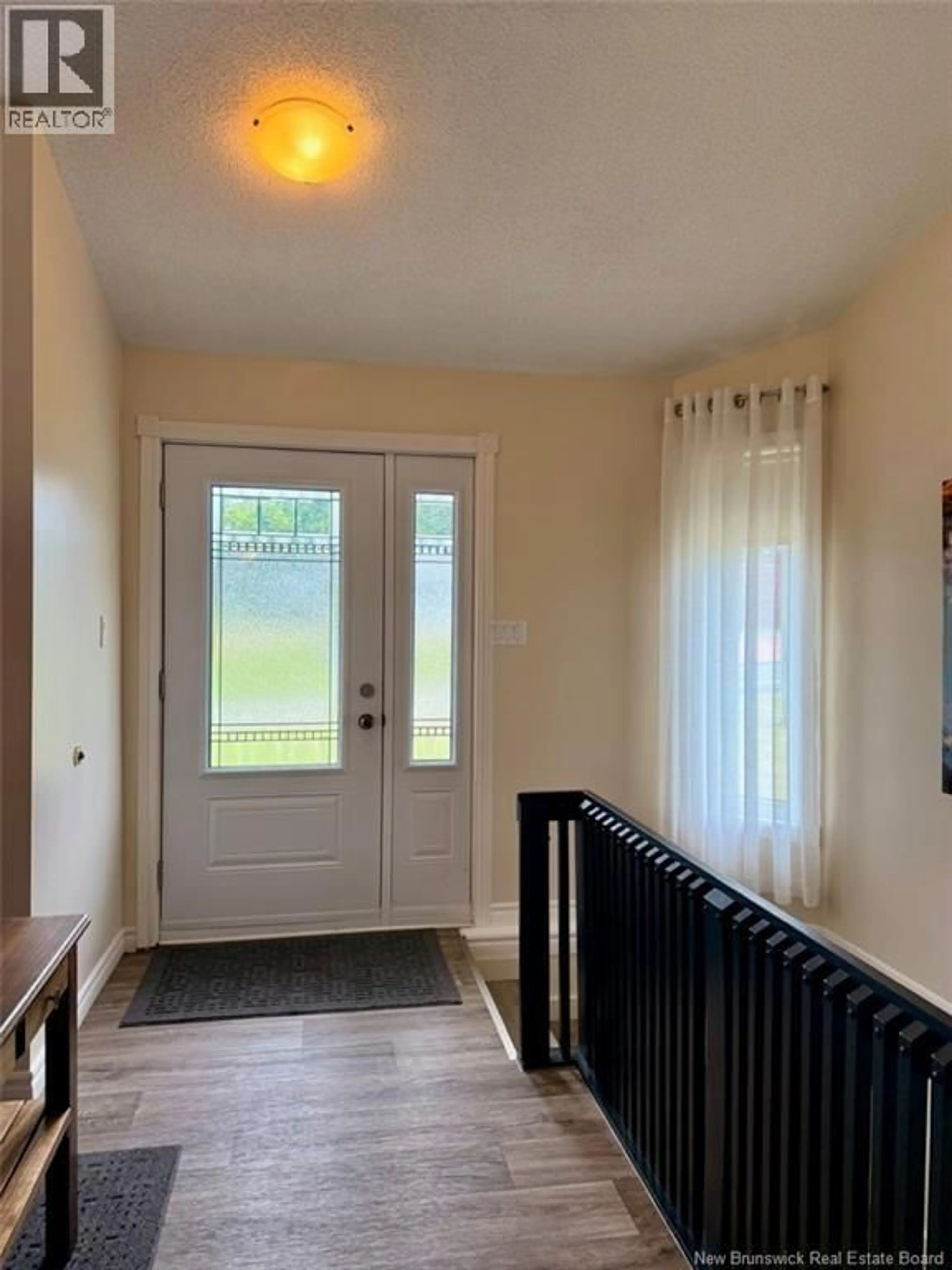Indoor entryway for 18 SAVOIE STREET, Balmoral New Brunswick E8E1J9