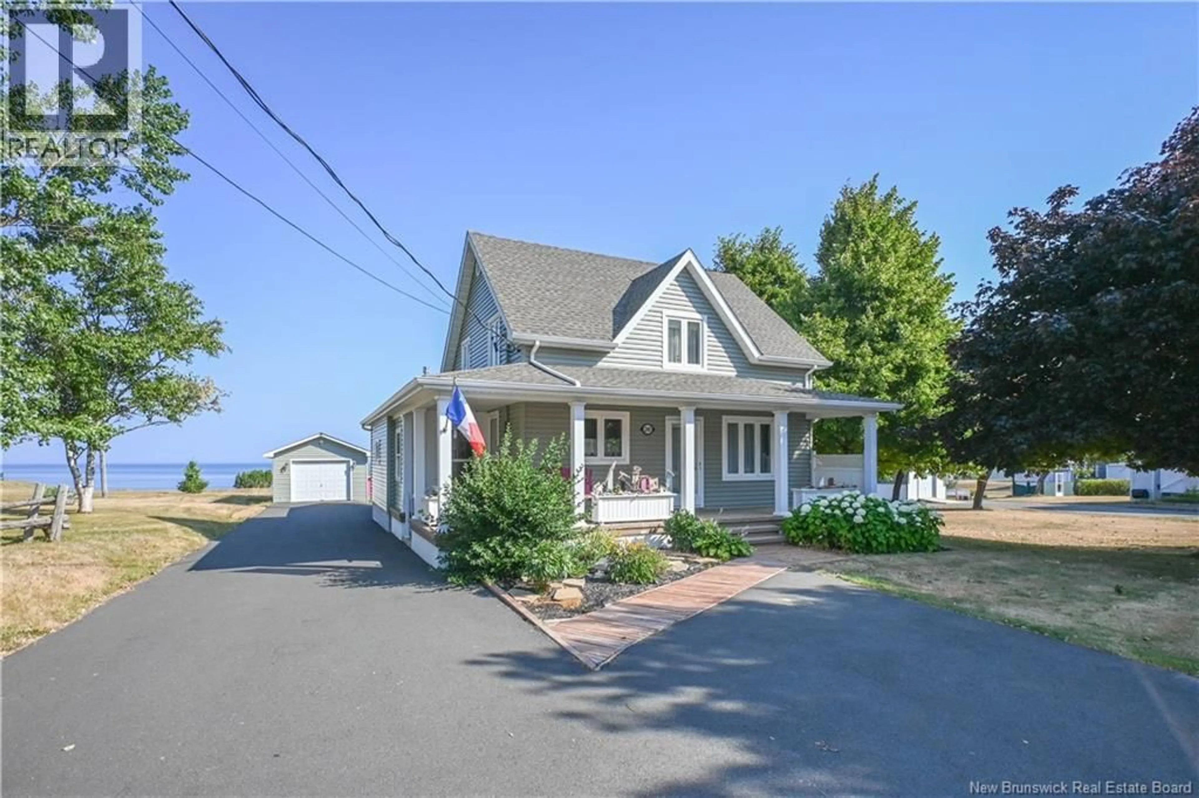 A pic from outside/outdoor area/front of a property/back of a property/a pic from drone, unknown for 245 SAINT-PIERRE BOULEVARD, Caraquet New Brunswick E1W1B1