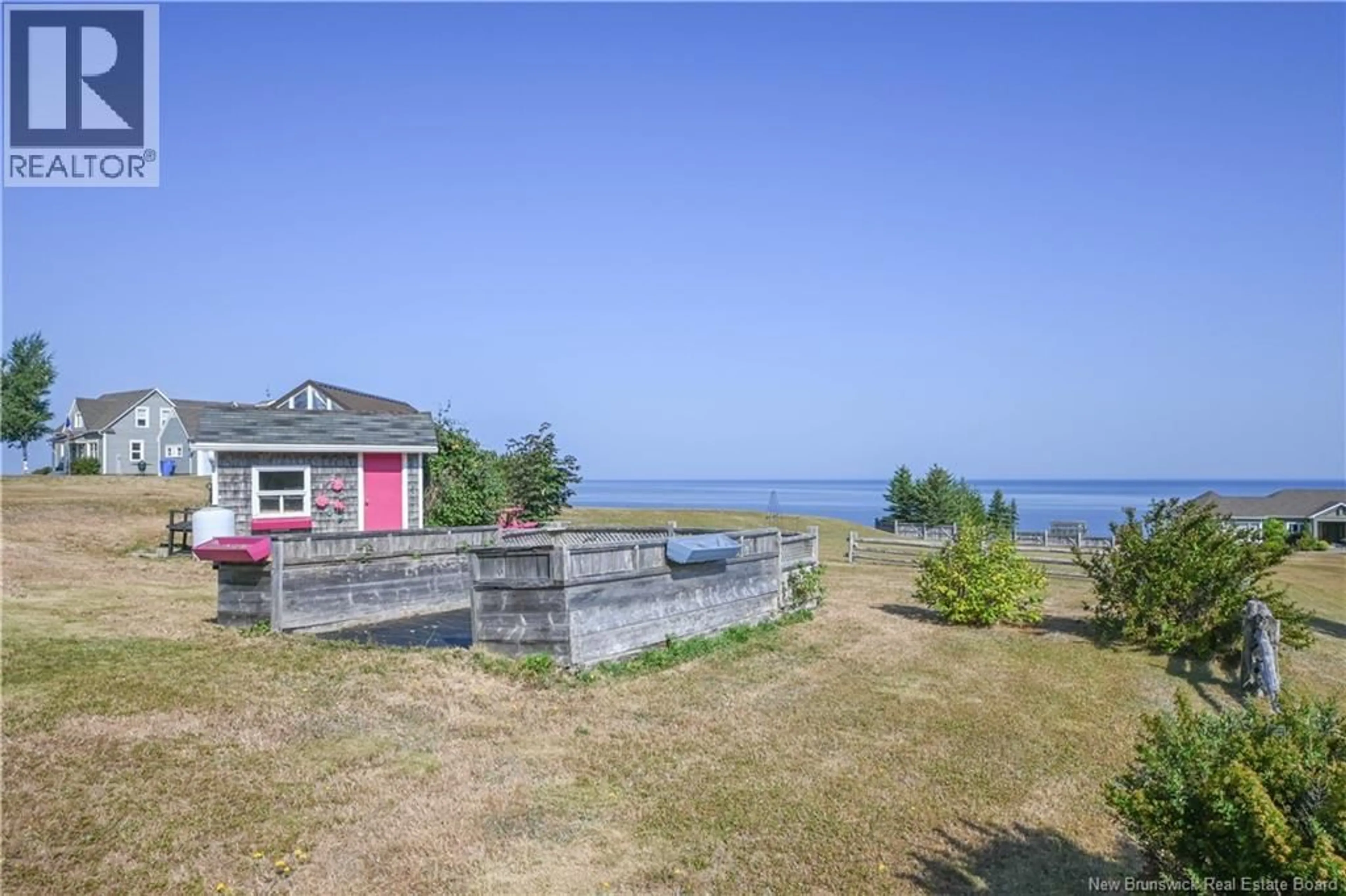 A pic from outside/outdoor area/front of a property/back of a property/a pic from drone, water/lake/river/ocean view for 245 SAINT-PIERRE BOULEVARD, Caraquet New Brunswick E1W1B1