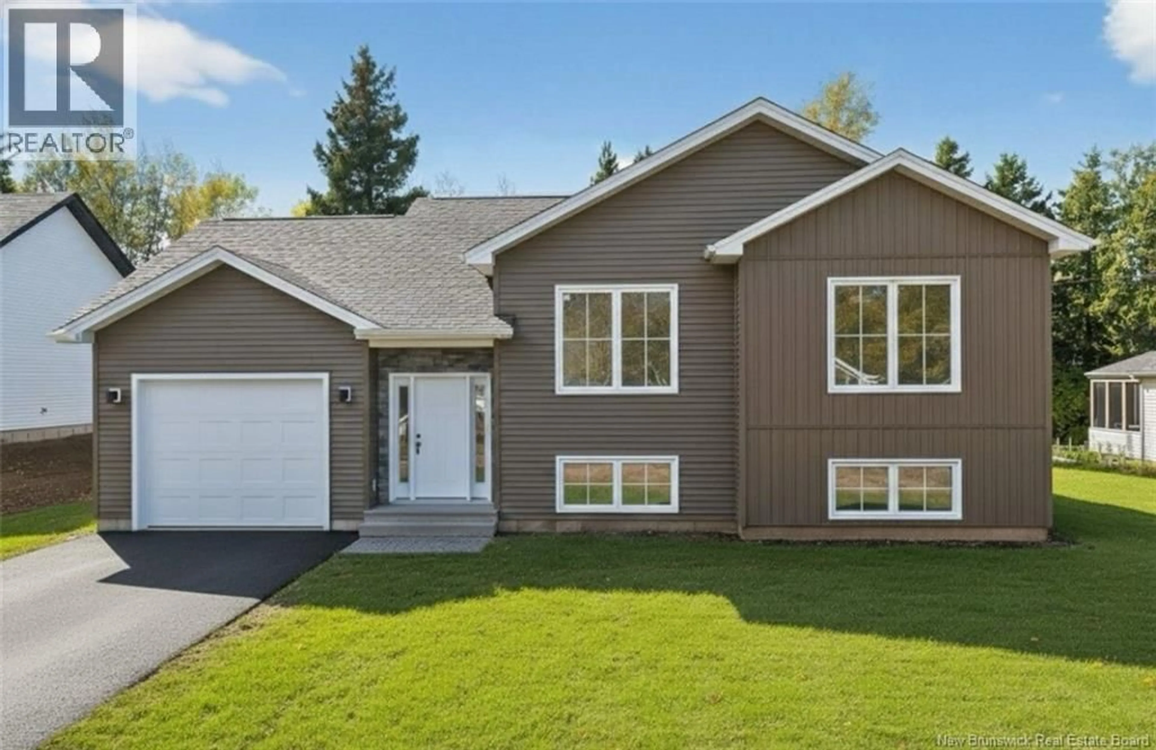 Home with vinyl exterior material, street for 141 CARTIER, Shediac New Brunswick E4P1L3