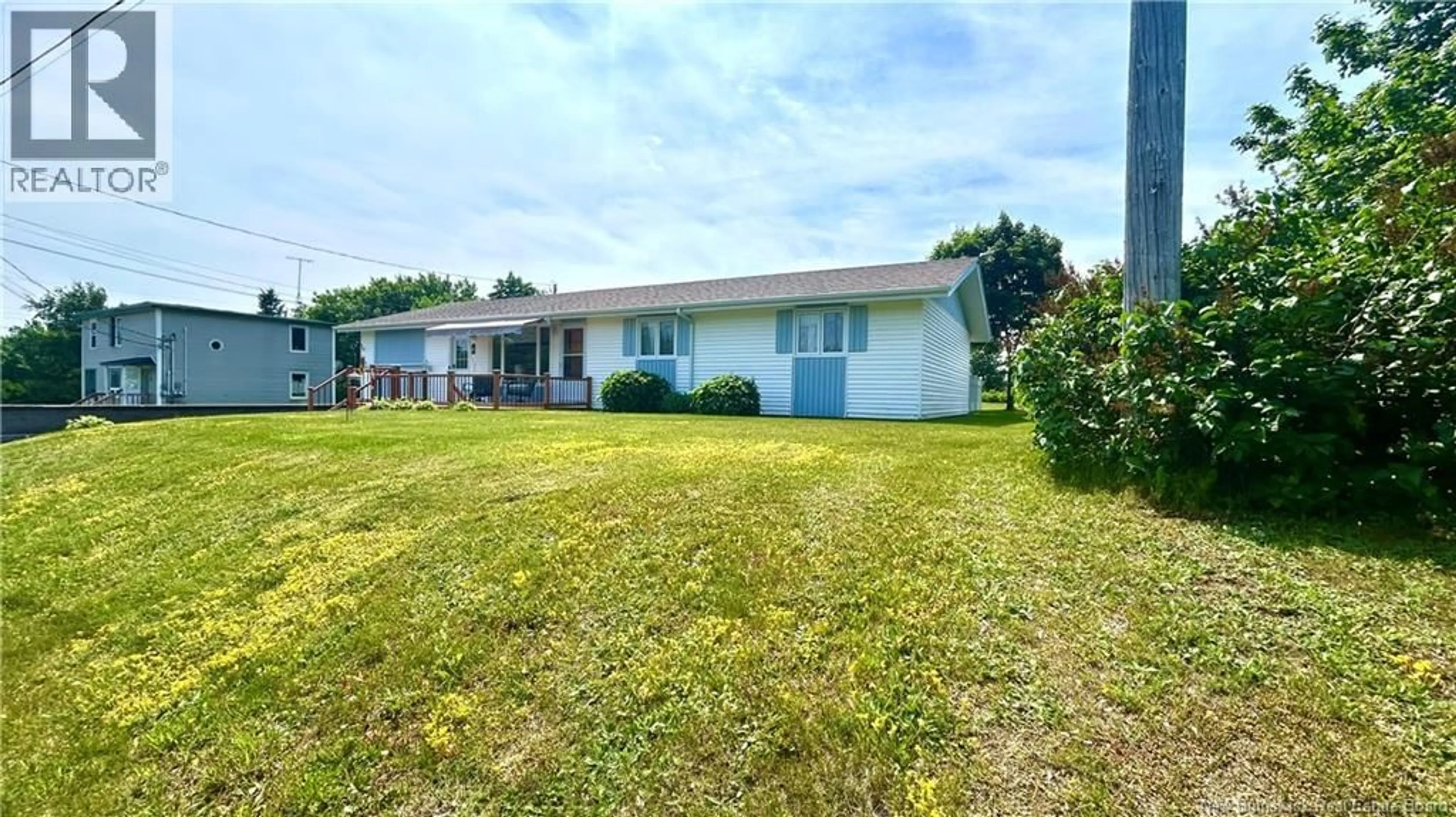 A pic from outside/outdoor area/front of a property/back of a property/a pic from drone, water/lake/river/ocean view for 16 DES PATRIOTES, Caraquet New Brunswick E1W1B6