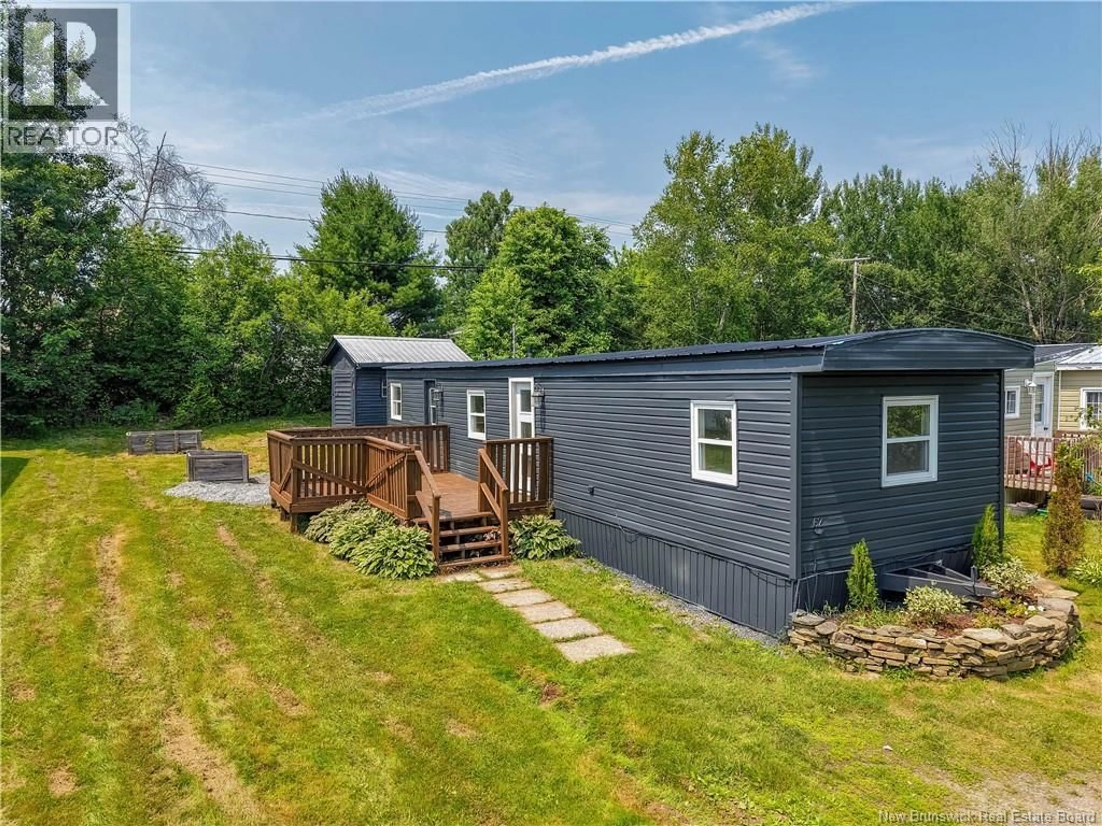 A pic from outside/outdoor area/front of a property/back of a property/a pic from drone, unknown for 62 HEDGEVIEW DRIVE, Hanwell New Brunswick E3B6S2