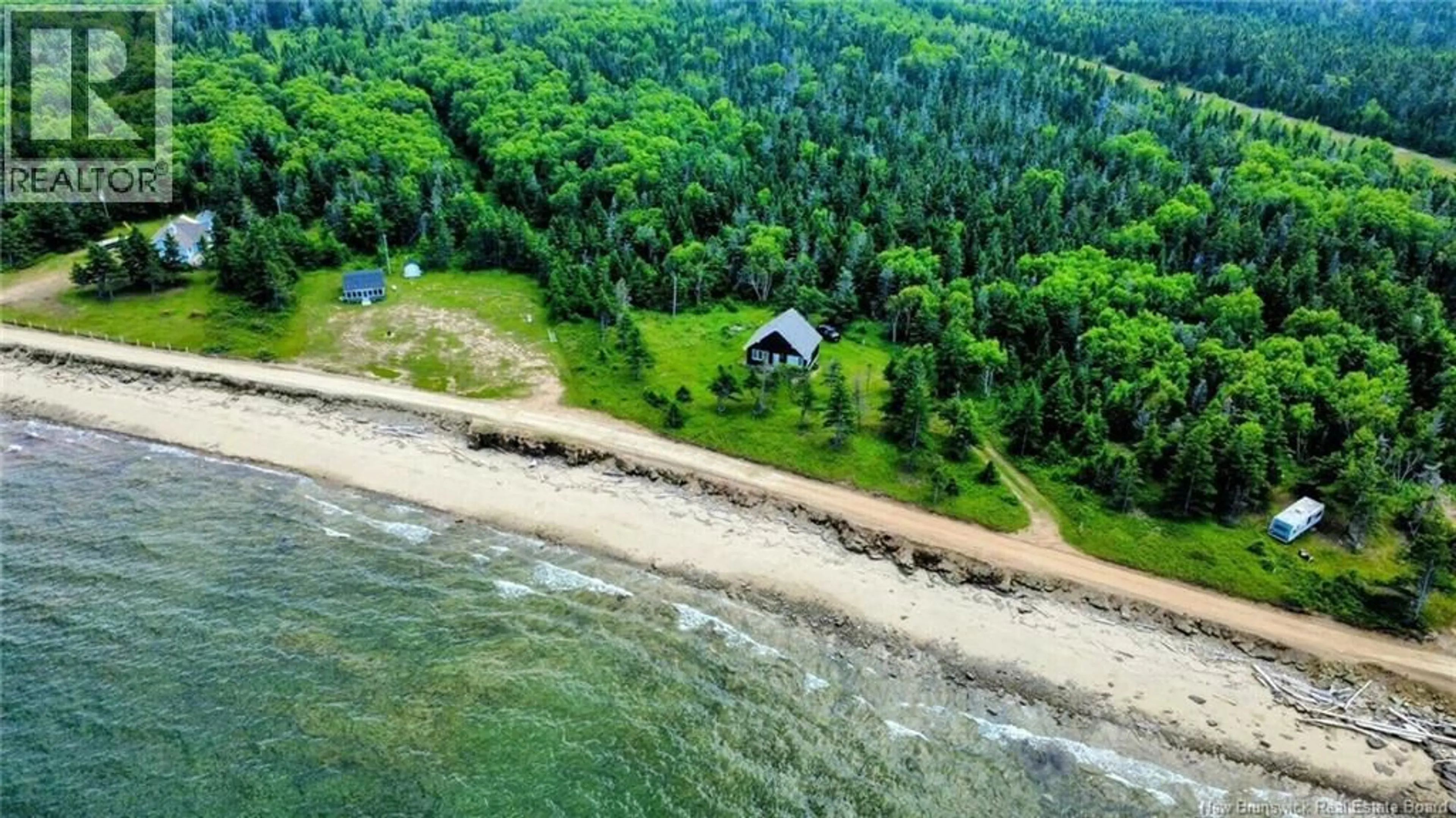 A pic from outside/outdoor area/front of a property/back of a property/a pic from drone, water/lake/river/ocean view for 430 CHEM. DES CHALETS, Maisonnette New Brunswick E8N2M2