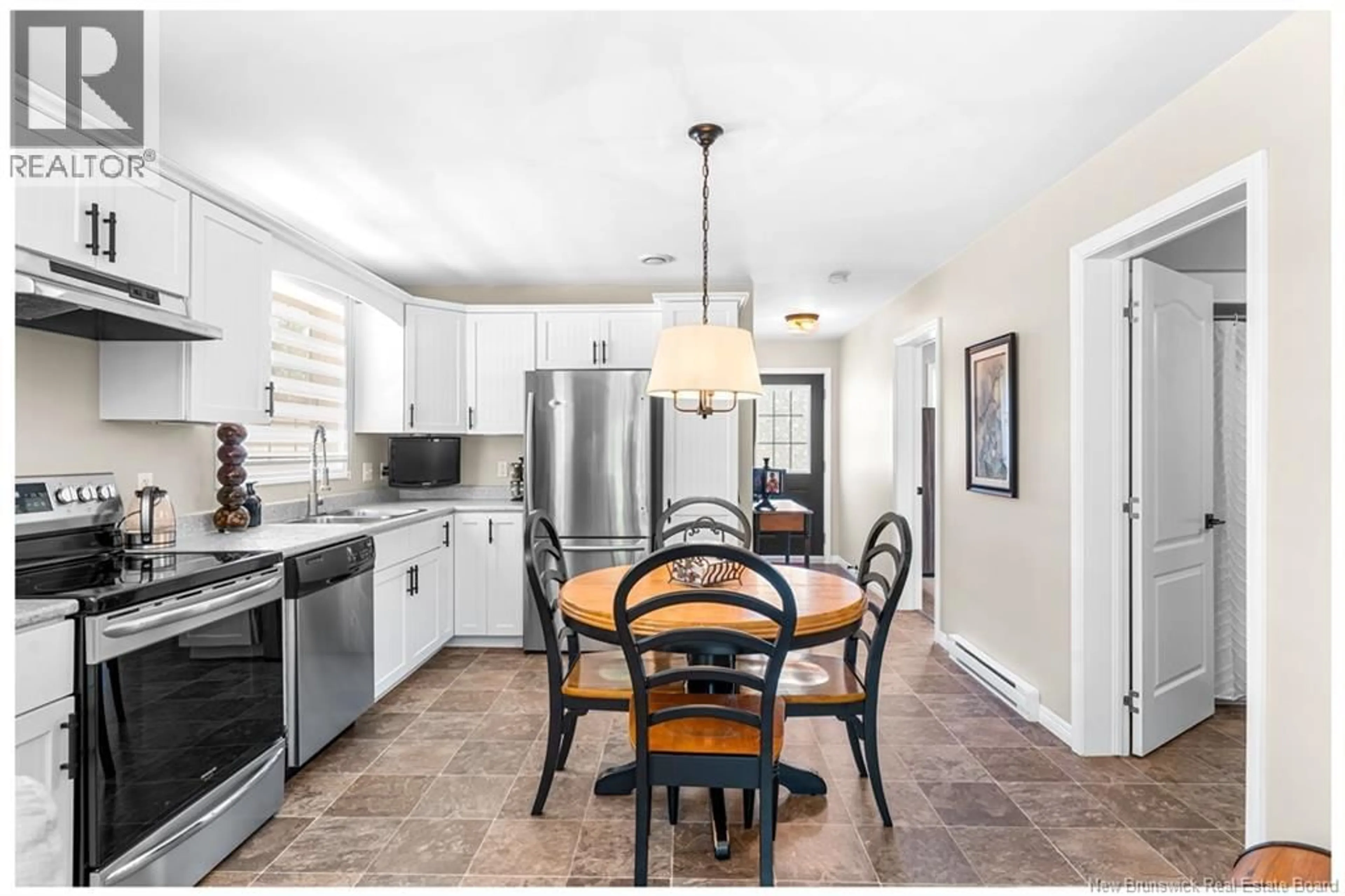 Open concept kitchen, ceramic/tile floor for 142 SEQUOIA, Moncton New Brunswick E1A0A2