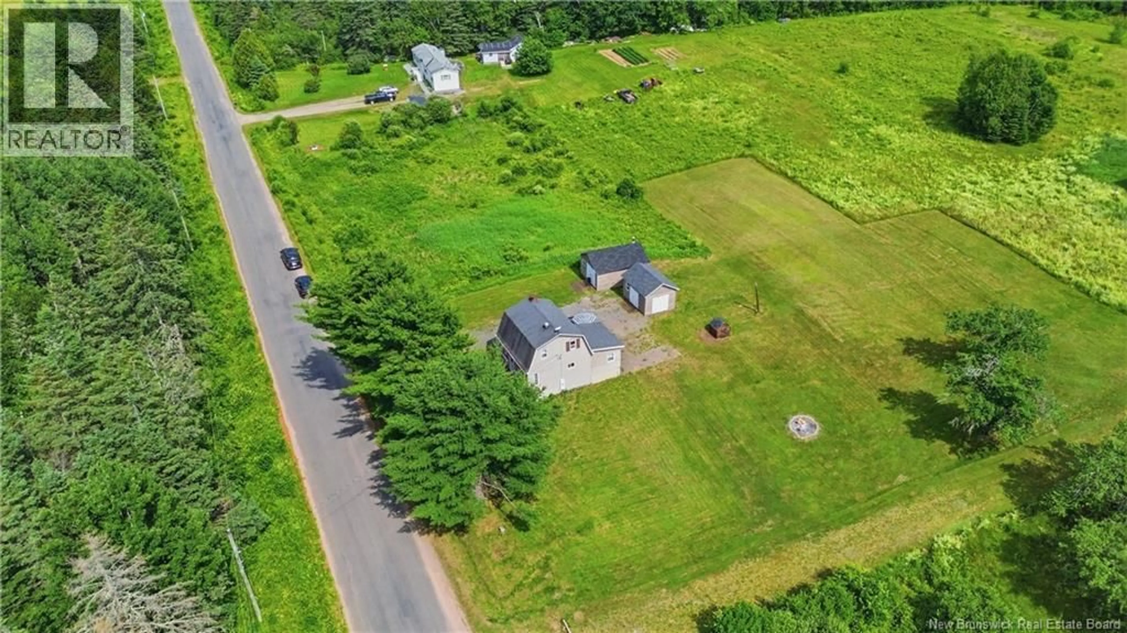 A pic from outside/outdoor area/front of a property/back of a property/a pic from drone, street for 675 SANDBROOK ROAD, Wirral New Brunswick E5L2L4