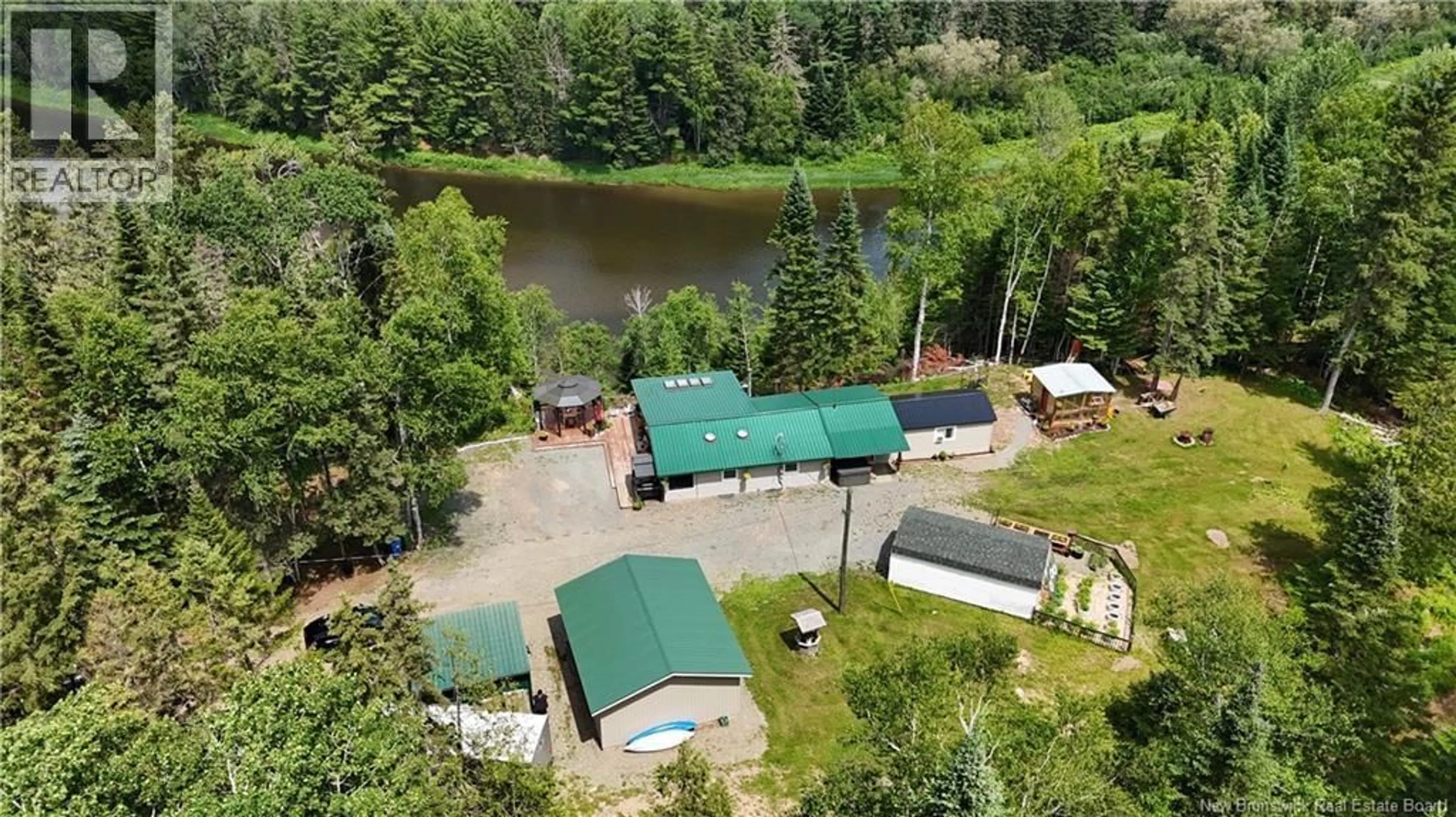 A pic from outside/outdoor area/front of a property/back of a property/a pic from drone, water/lake/river/ocean view for 1546 ROUTE 385, Oxbow New Brunswick E7G3E8