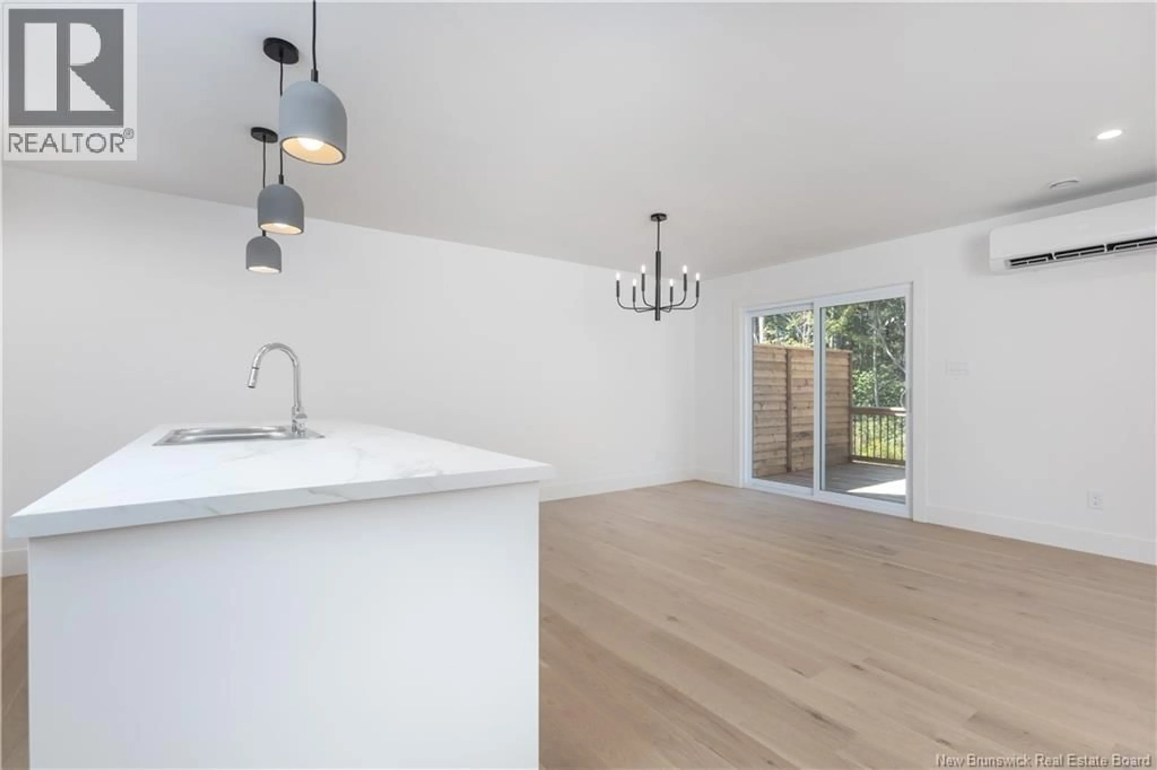 Open concept kitchen, wood/laminate floor for 125 ROSENBURG STREET, Moncton New Brunswick E1G6E9
