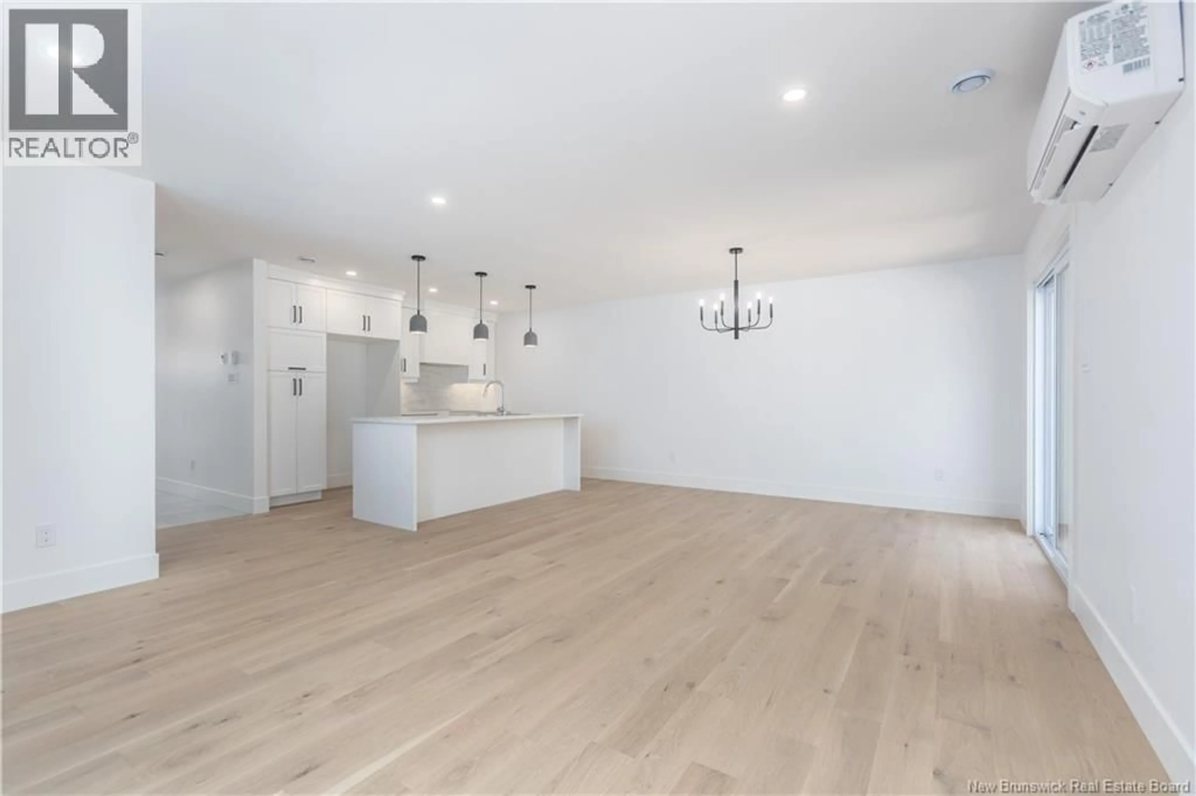 Open concept kitchen, wood/laminate floor for 125 ROSENBURG STREET, Moncton New Brunswick E1G6E9