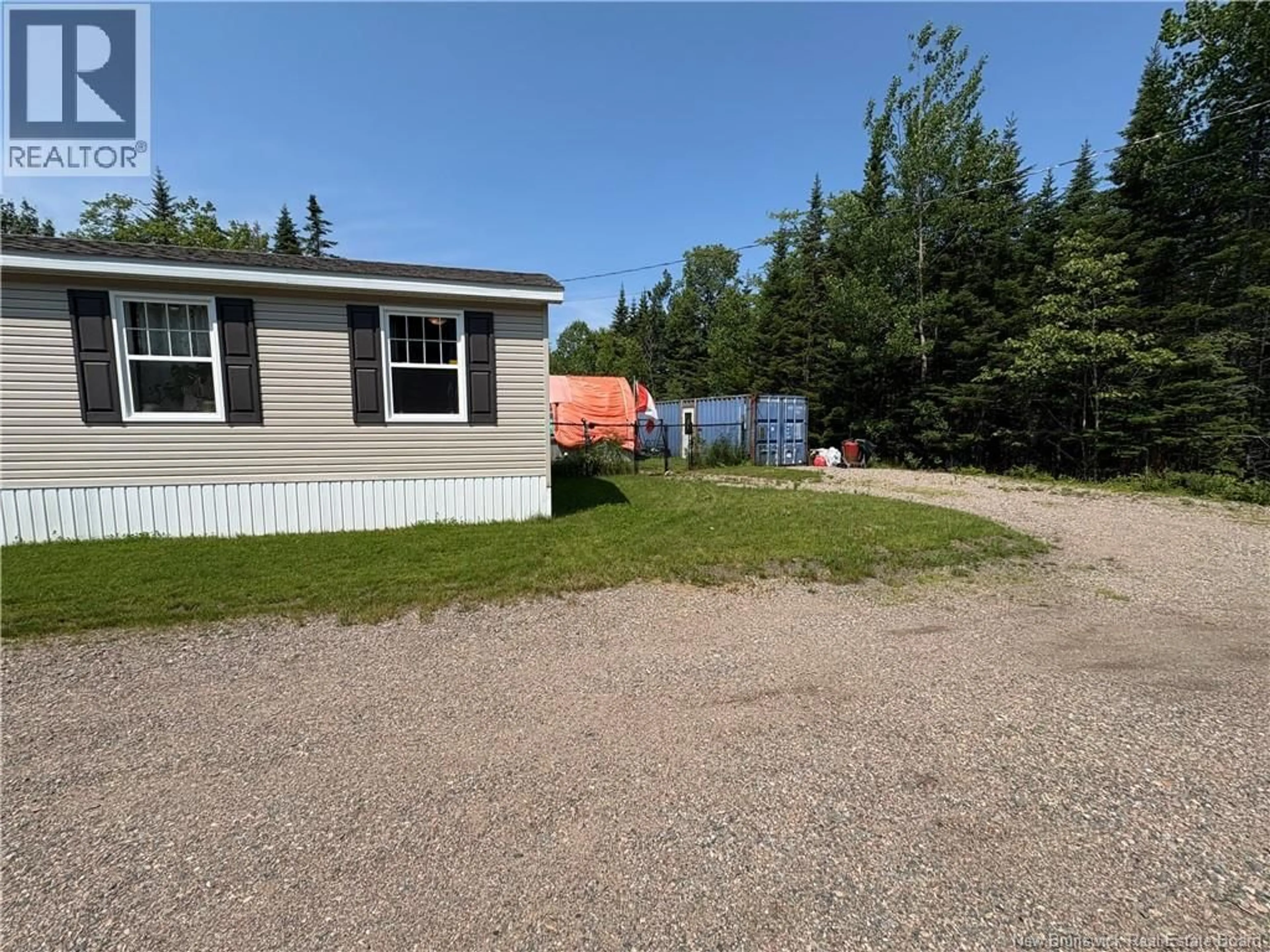 A pic from outside/outdoor area/front of a property/back of a property/a pic from drone, unknown for 25 WETMORE CREEK ROAD, Musquash New Brunswick E5J2L1