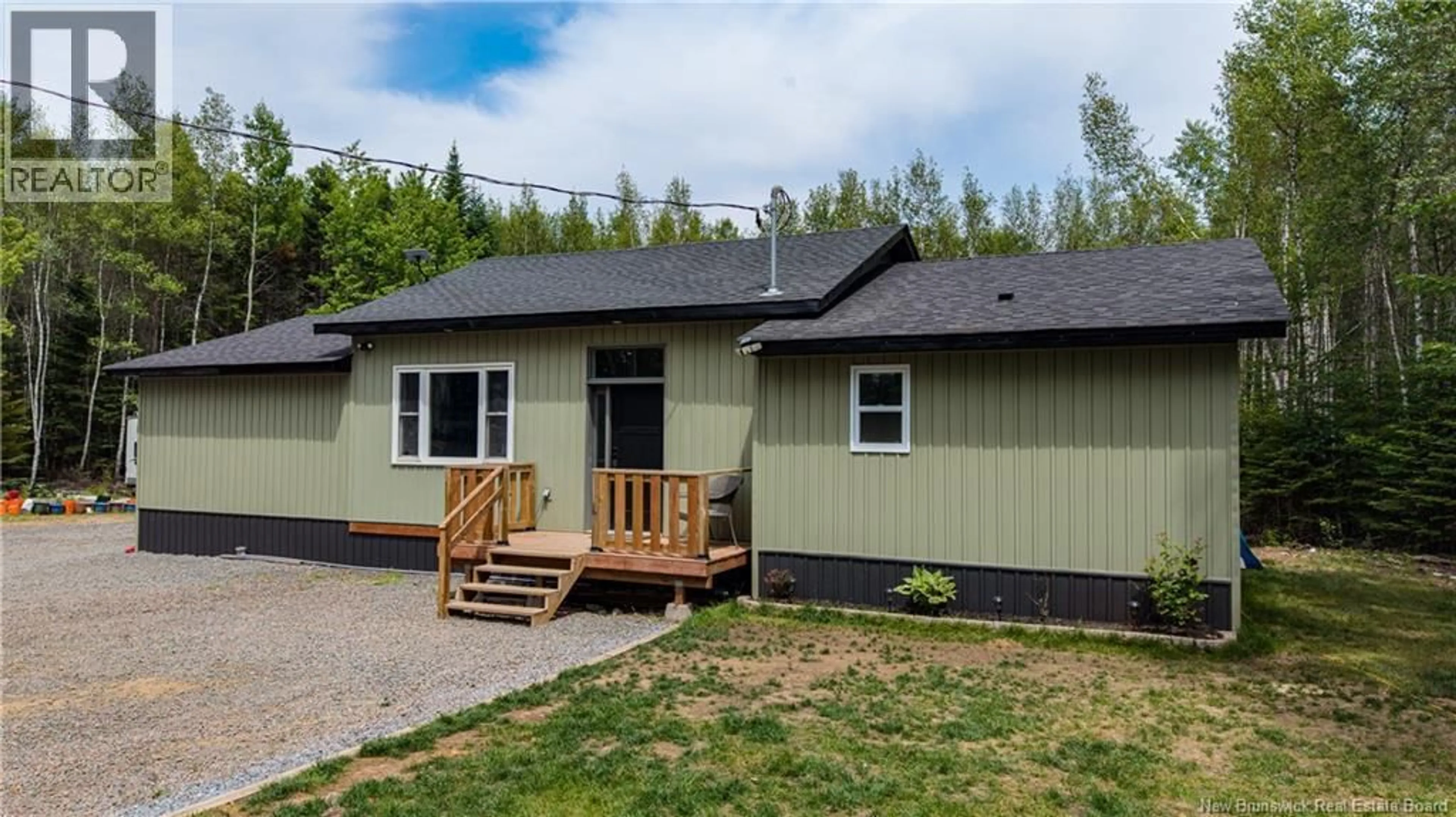 Home with vinyl exterior material, street for 477 VILLAGE DES CORMIER ROAD, Saint-Paul New Brunswick E4T3G7