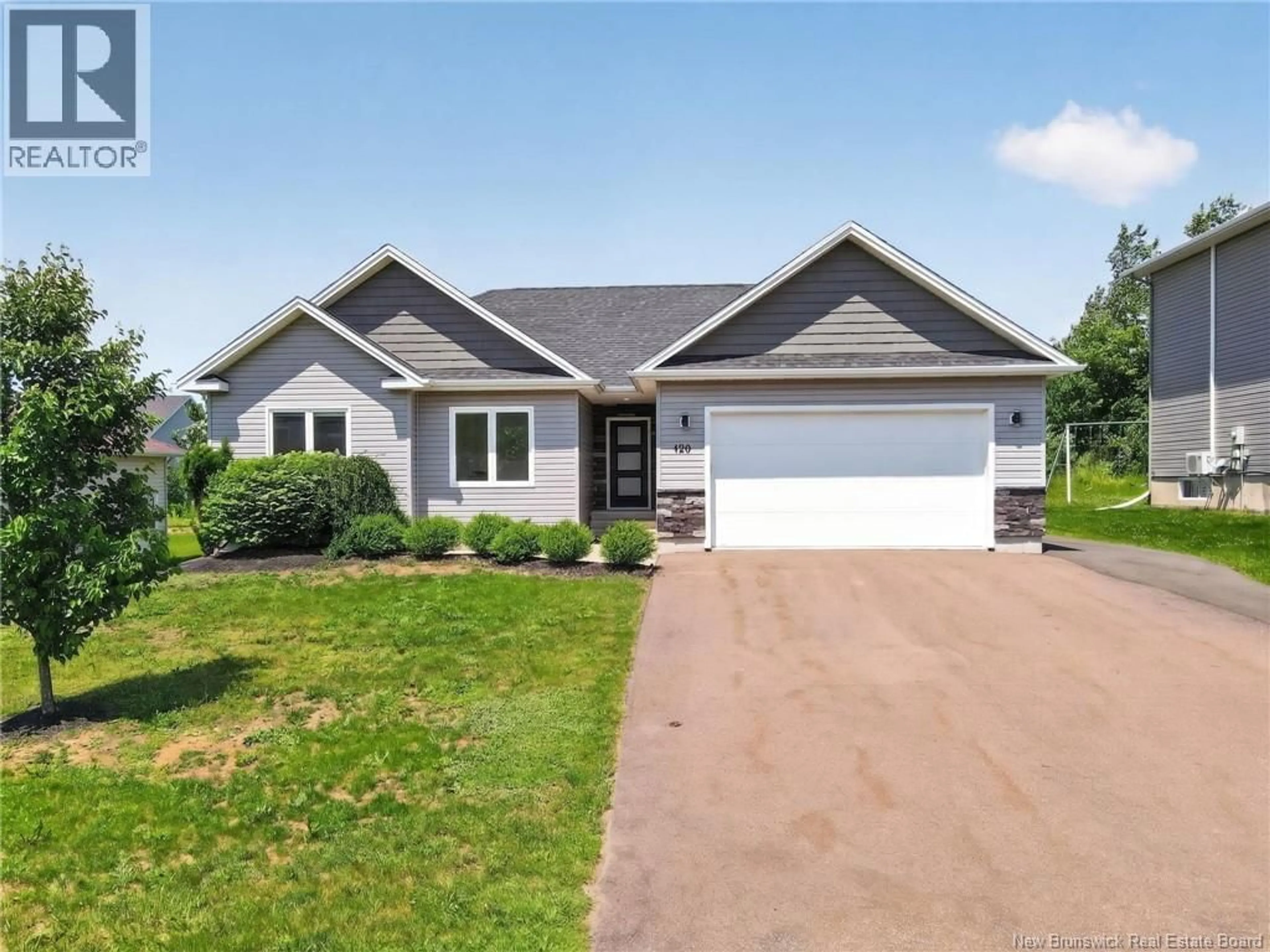 Home with vinyl exterior material, street for 120 DOIRON, Dieppe New Brunswick E1A0X8