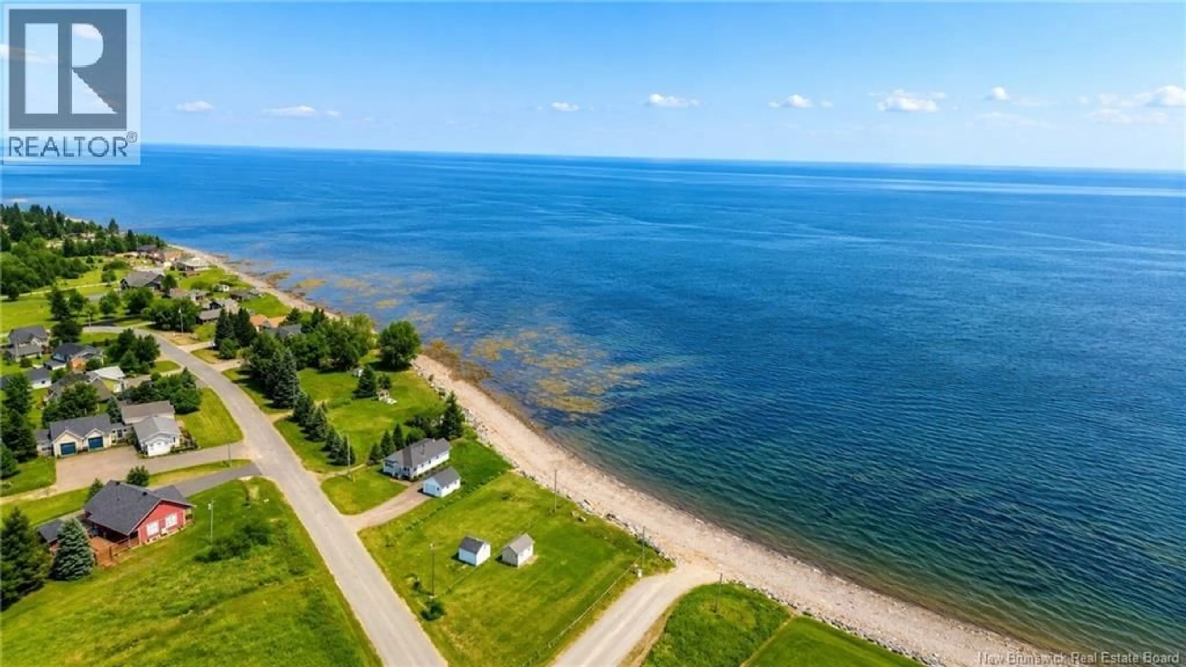 A pic from outside/outdoor area/front of a property/back of a property/a pic from drone, water/lake/river/ocean view for 485 RUE MSGR RICHARD, Beresford New Brunswick E8K1Y9