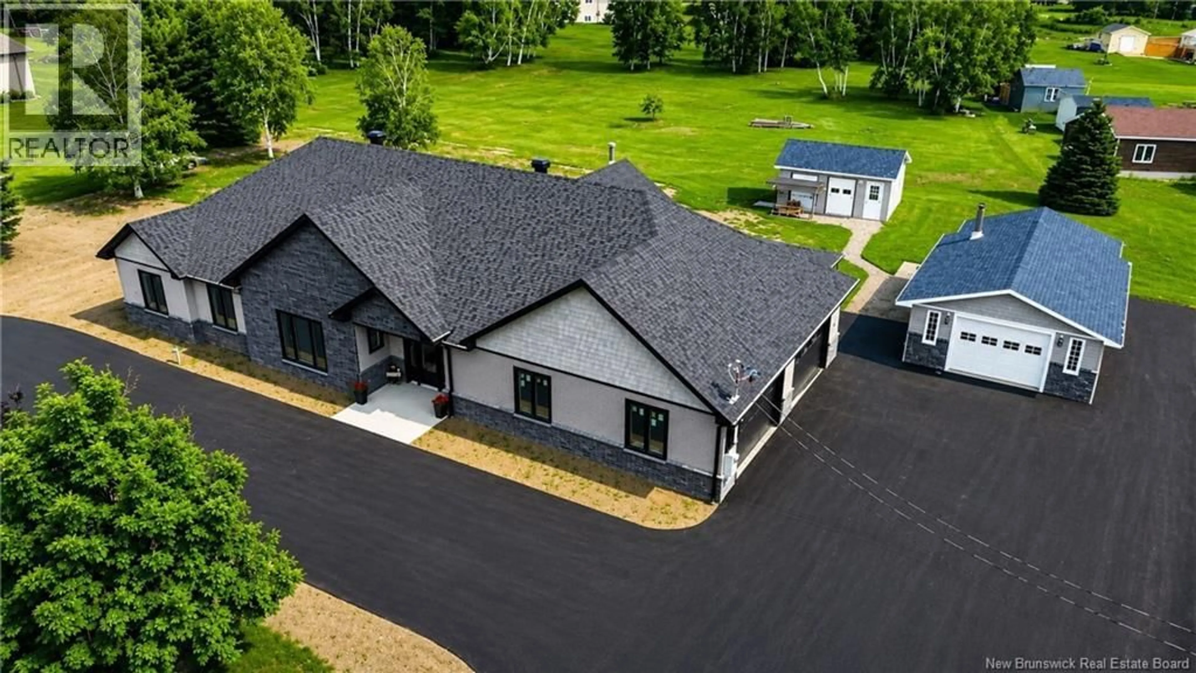A pic from outside/outdoor area/front of a property/back of a property/a pic from drone, building for 826 CH HINTON, Dunlop New Brunswick E8K2J9