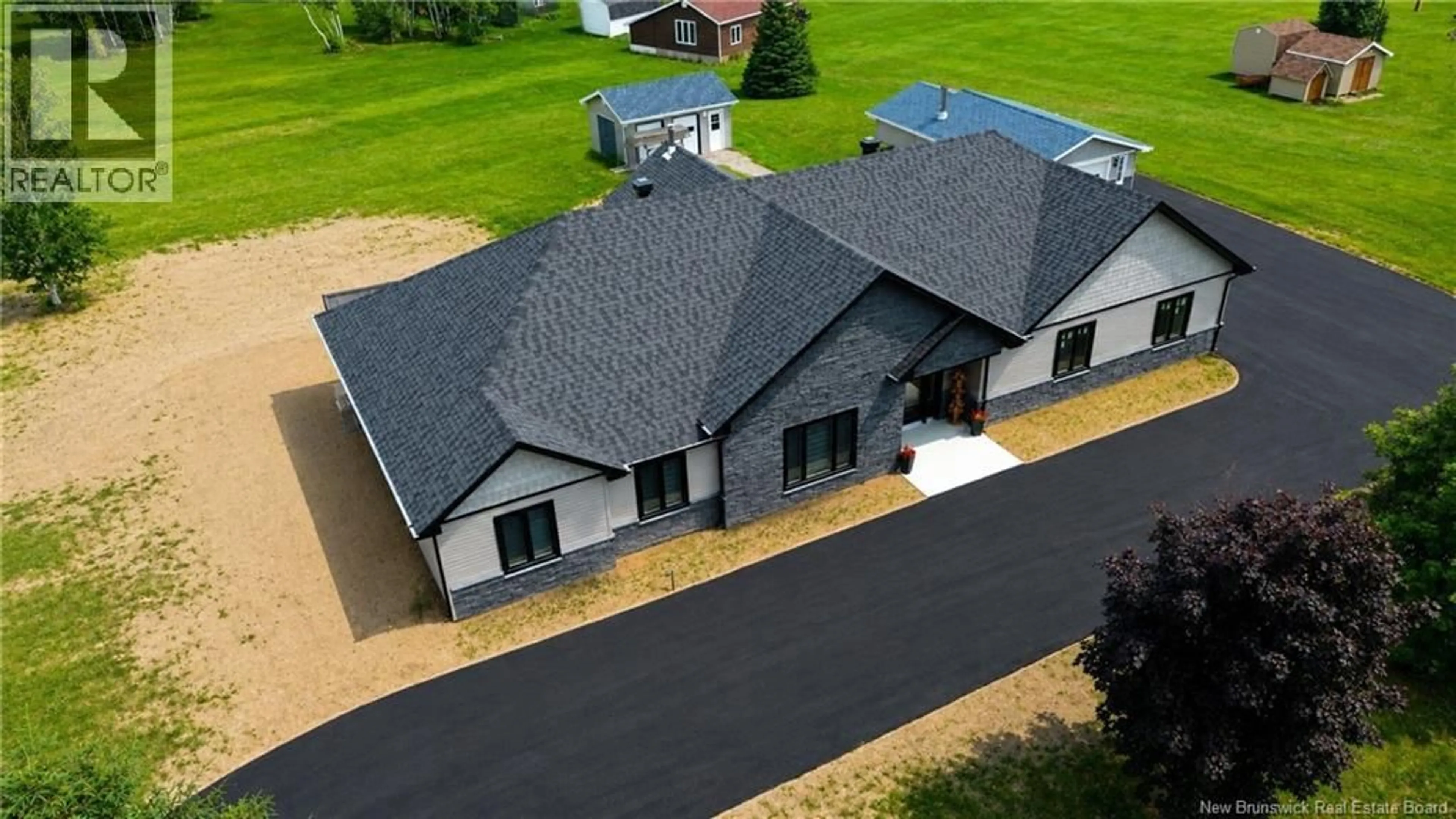 A pic from outside/outdoor area/front of a property/back of a property/a pic from drone, building for 826 CH HINTON, Dunlop New Brunswick E8K2J9