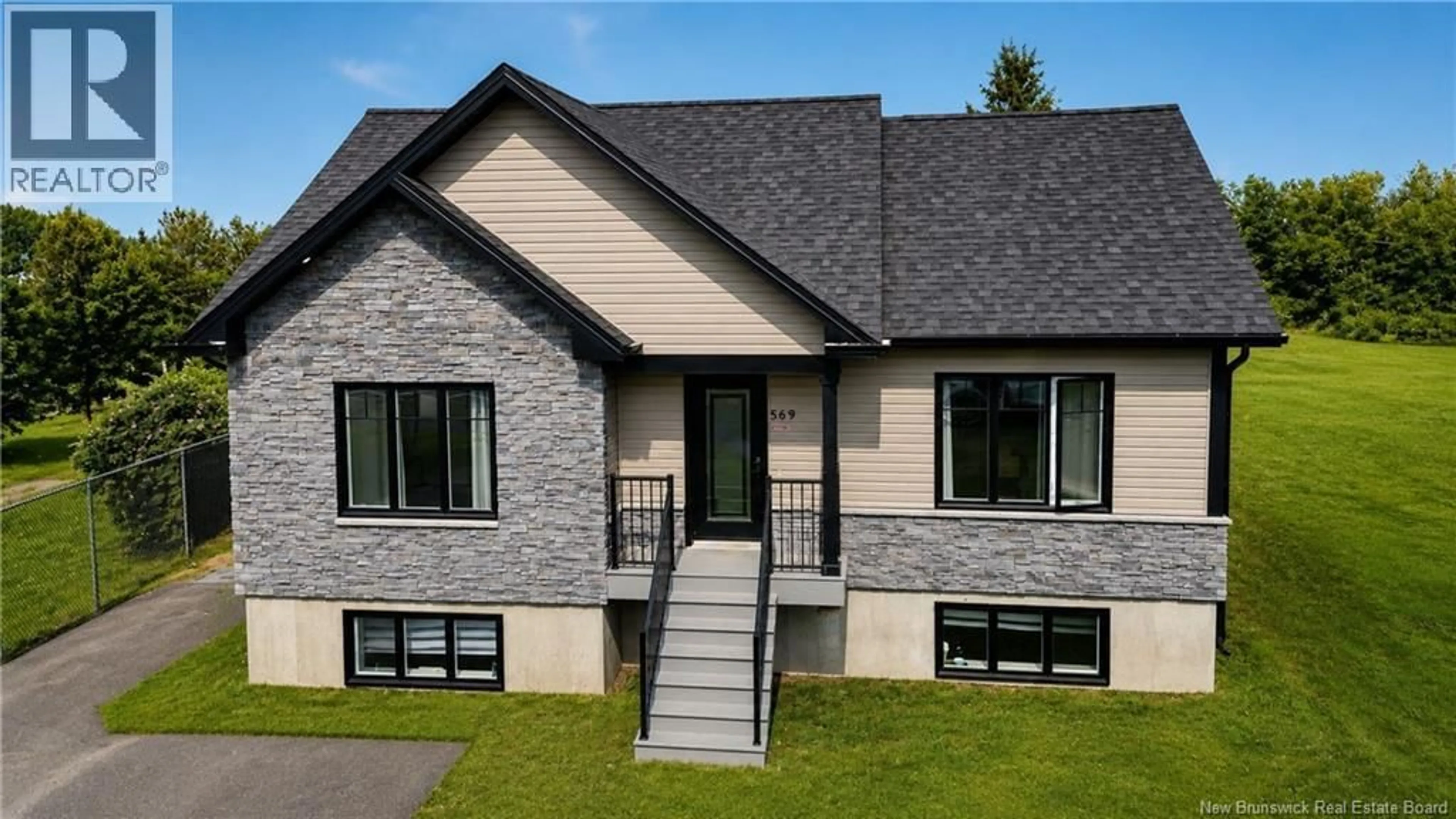 Home with brick exterior material, street for 569 RUE PRINCIPALE, Beresford New Brunswick E8K1X6