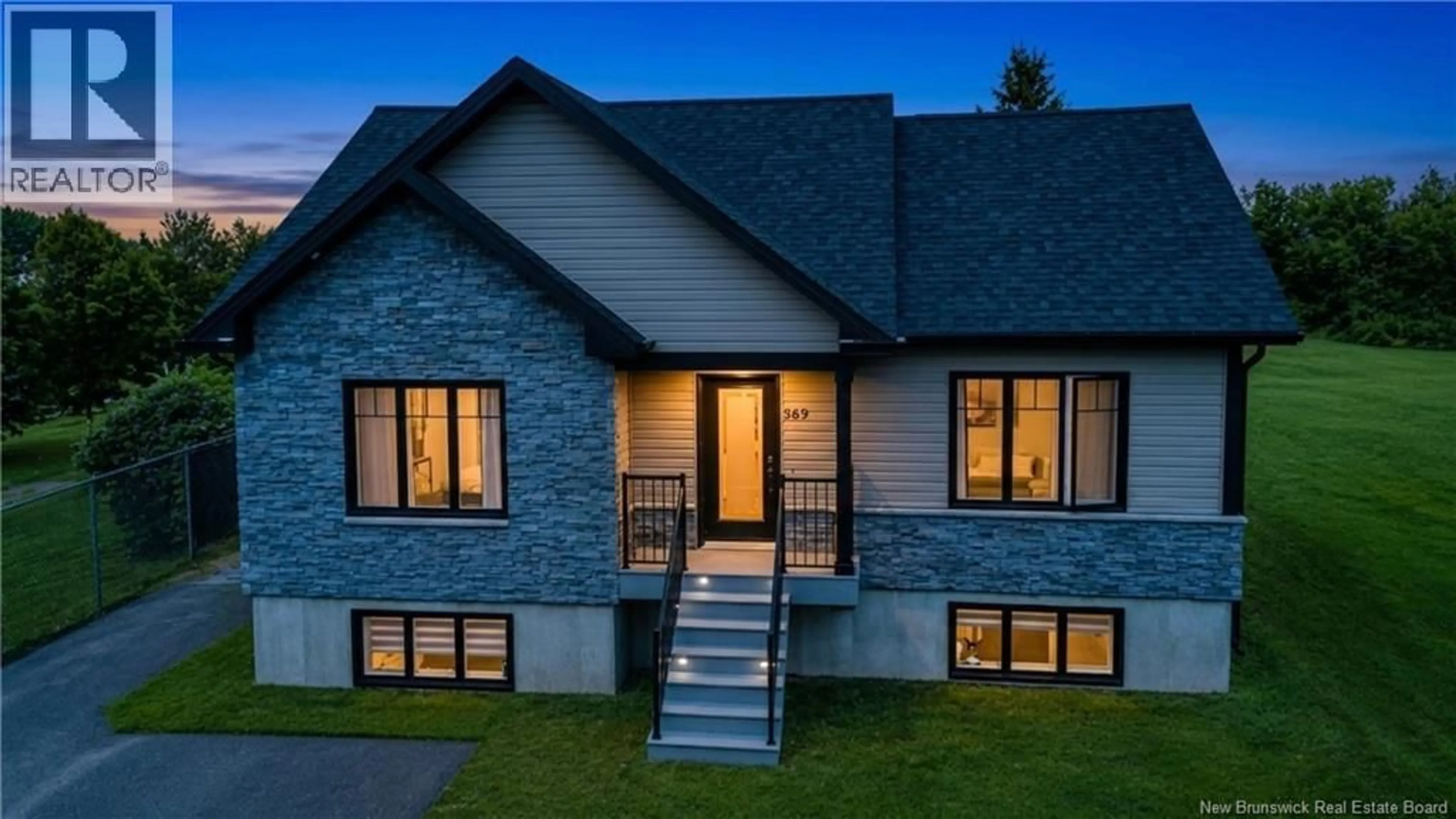Home with brick exterior material, building for 569 RUE PRINCIPALE, Beresford New Brunswick E8K1X6
