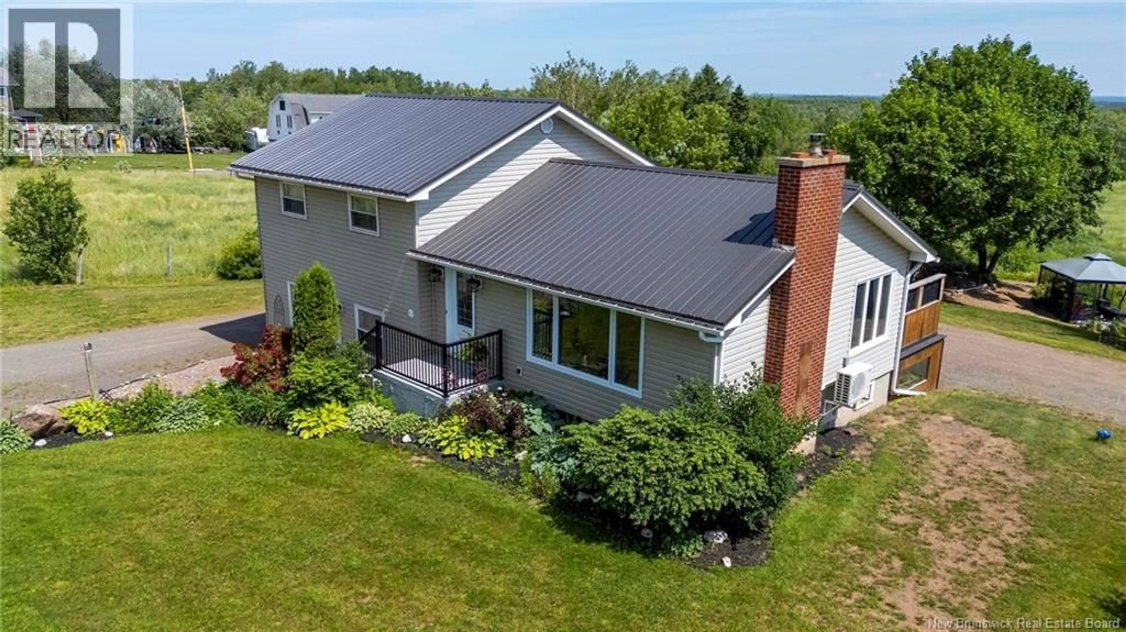 A pic from outside/outdoor area/front of a property/back of a property/a pic from drone, building for 252 AMMON ROAD, Ammon New Brunswick E1G3N8