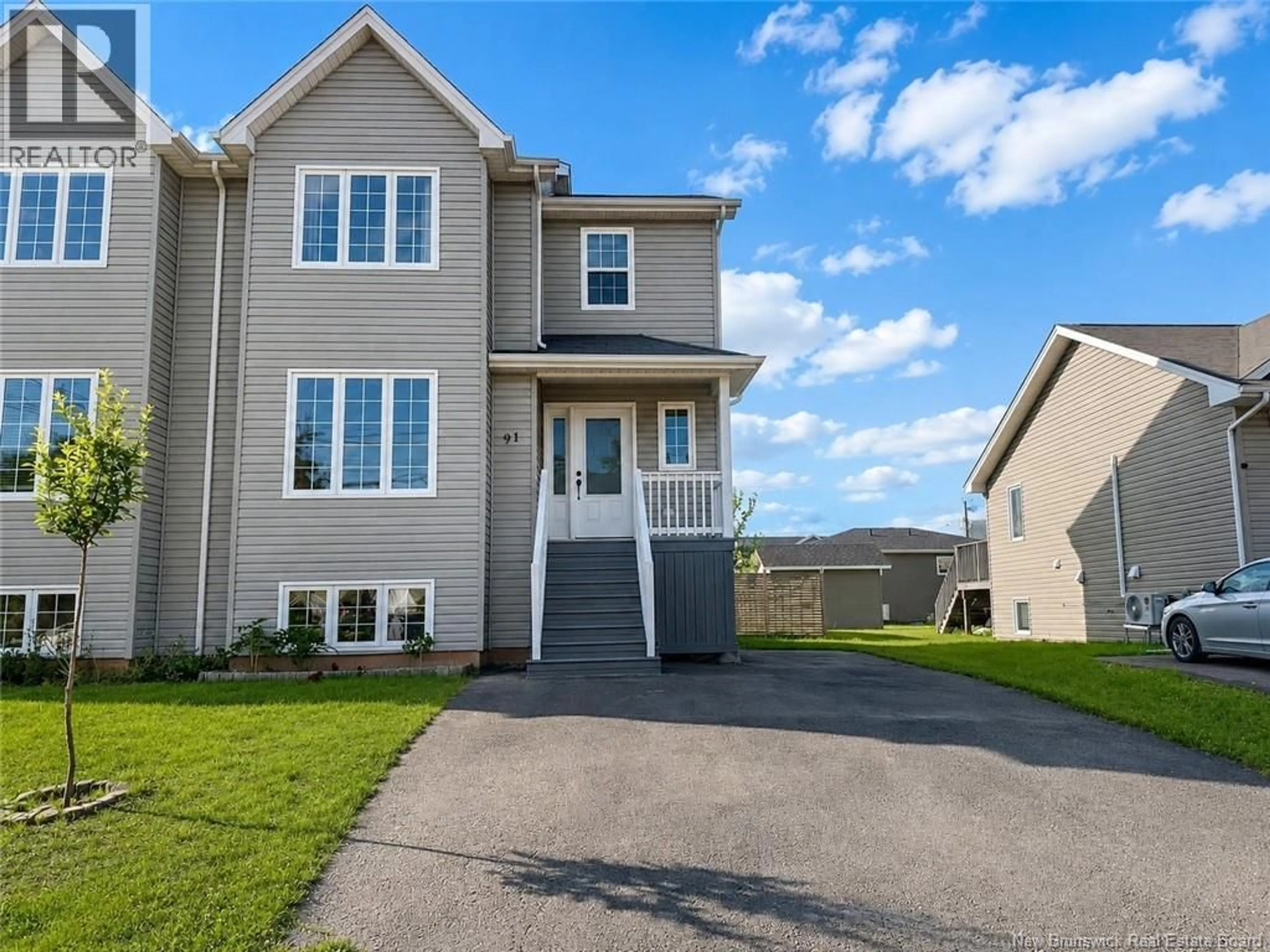 Home with vinyl exterior material, street for 91 HOLLAND DRIVE, Moncton New Brunswick E1G0X5
