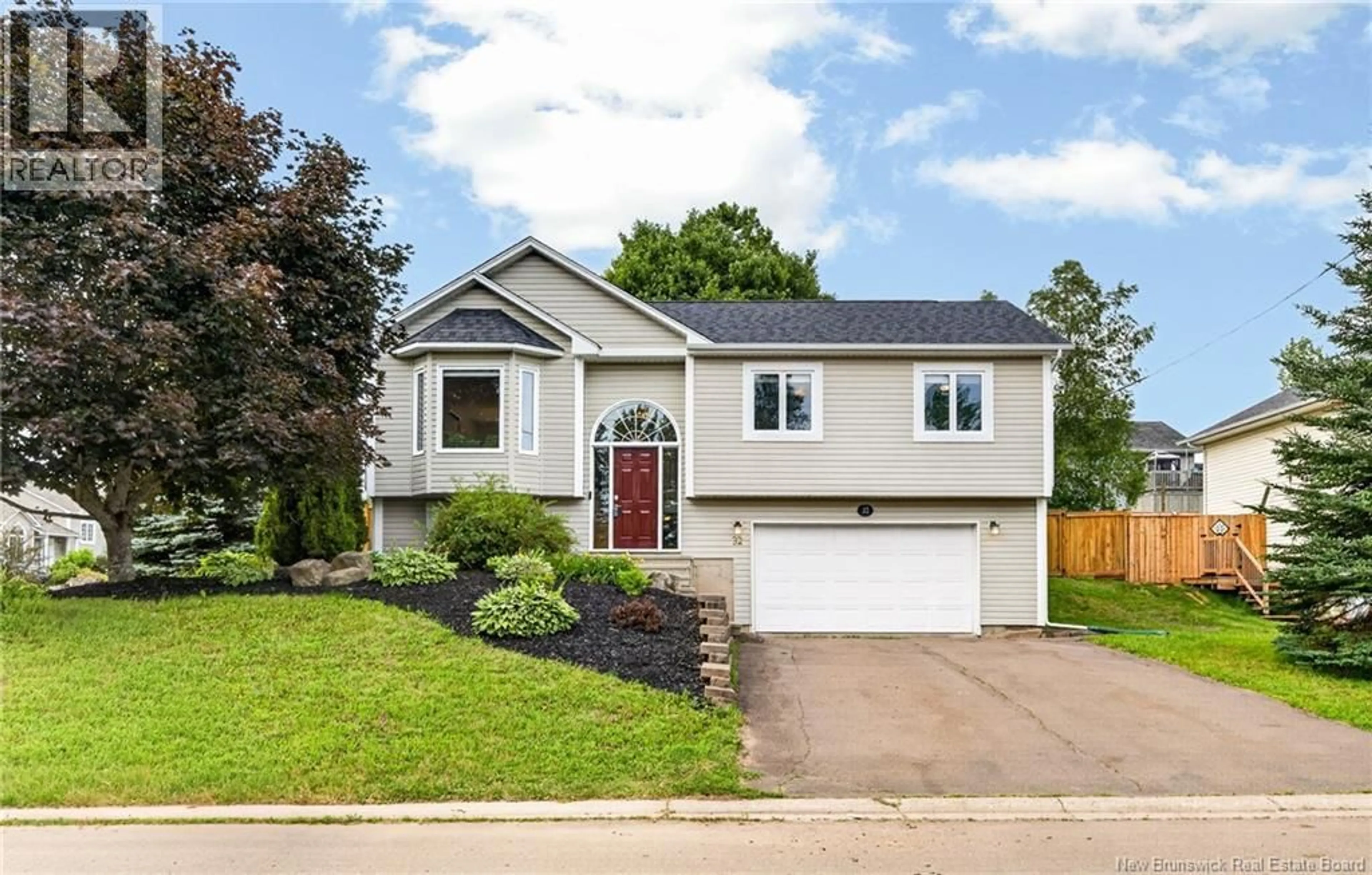 Home with vinyl exterior material, street for 32 DU RUISSEAU STREET, Dieppe New Brunswick E1A8B3