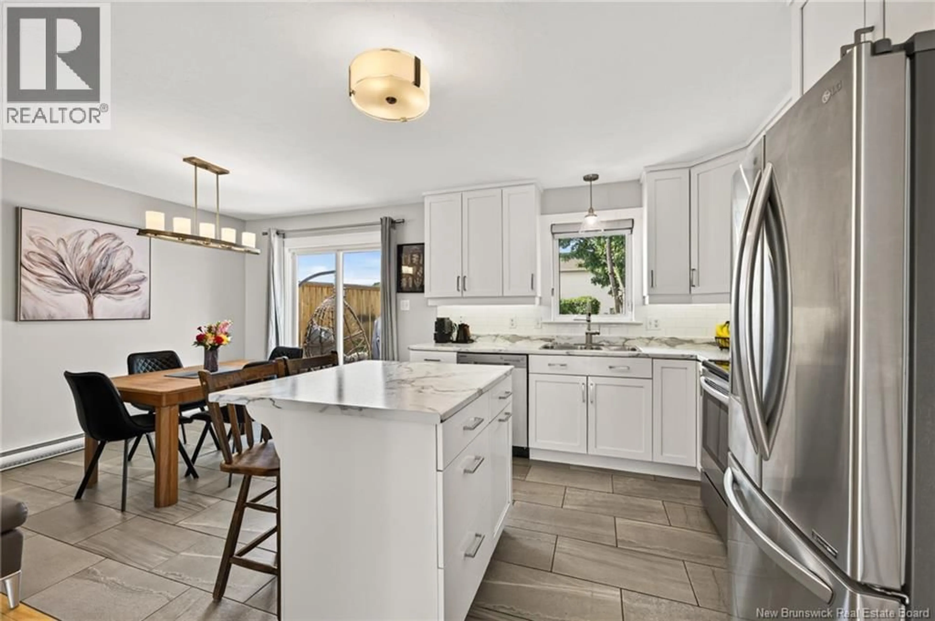 Open concept kitchen, ceramic/tile floor for 32 DU RUISSEAU STREET, Dieppe New Brunswick E1A8B3