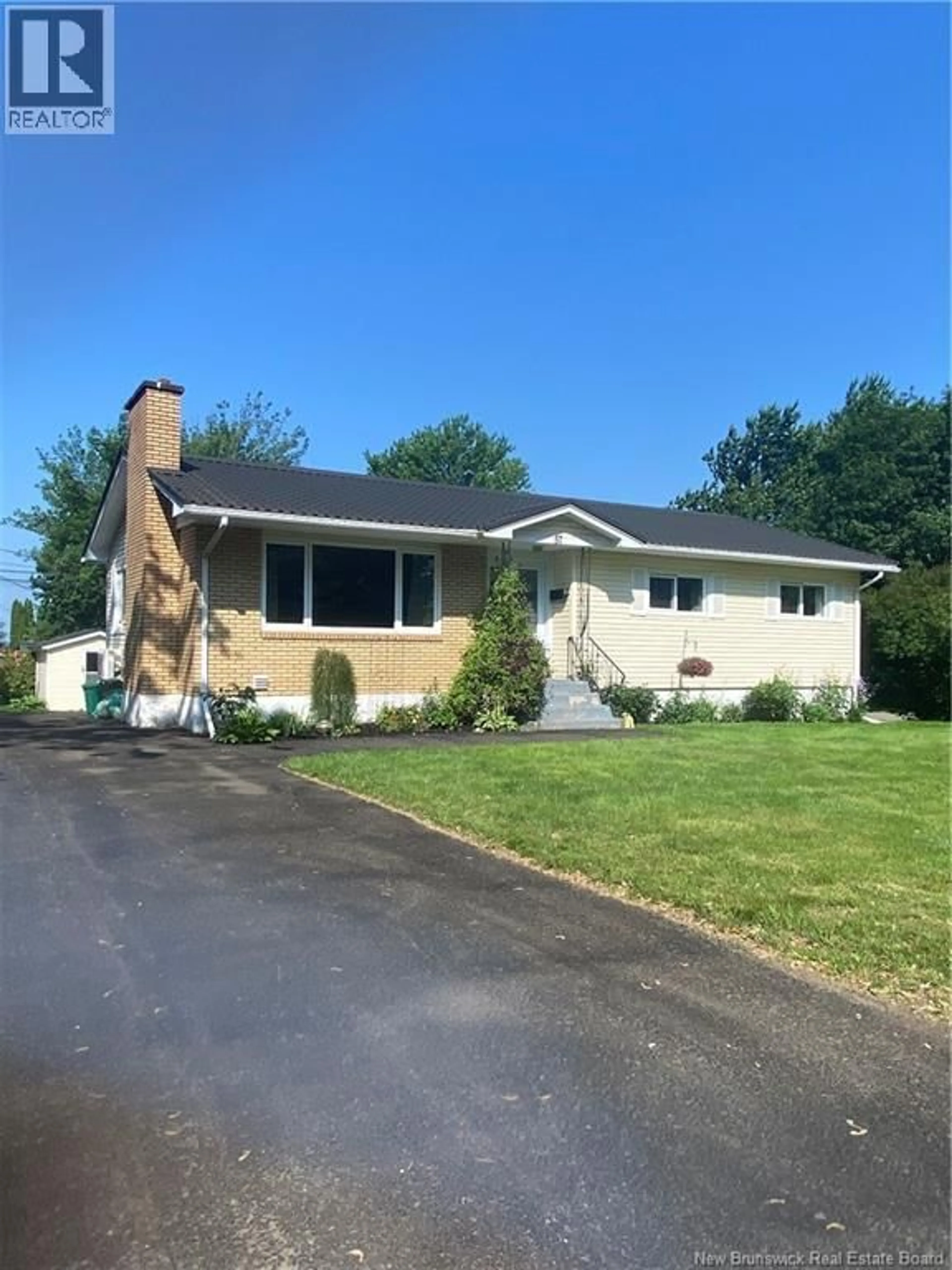 Home with vinyl exterior material, street for 57 WILSON ROAD, Riverview New Brunswick E1B2W3