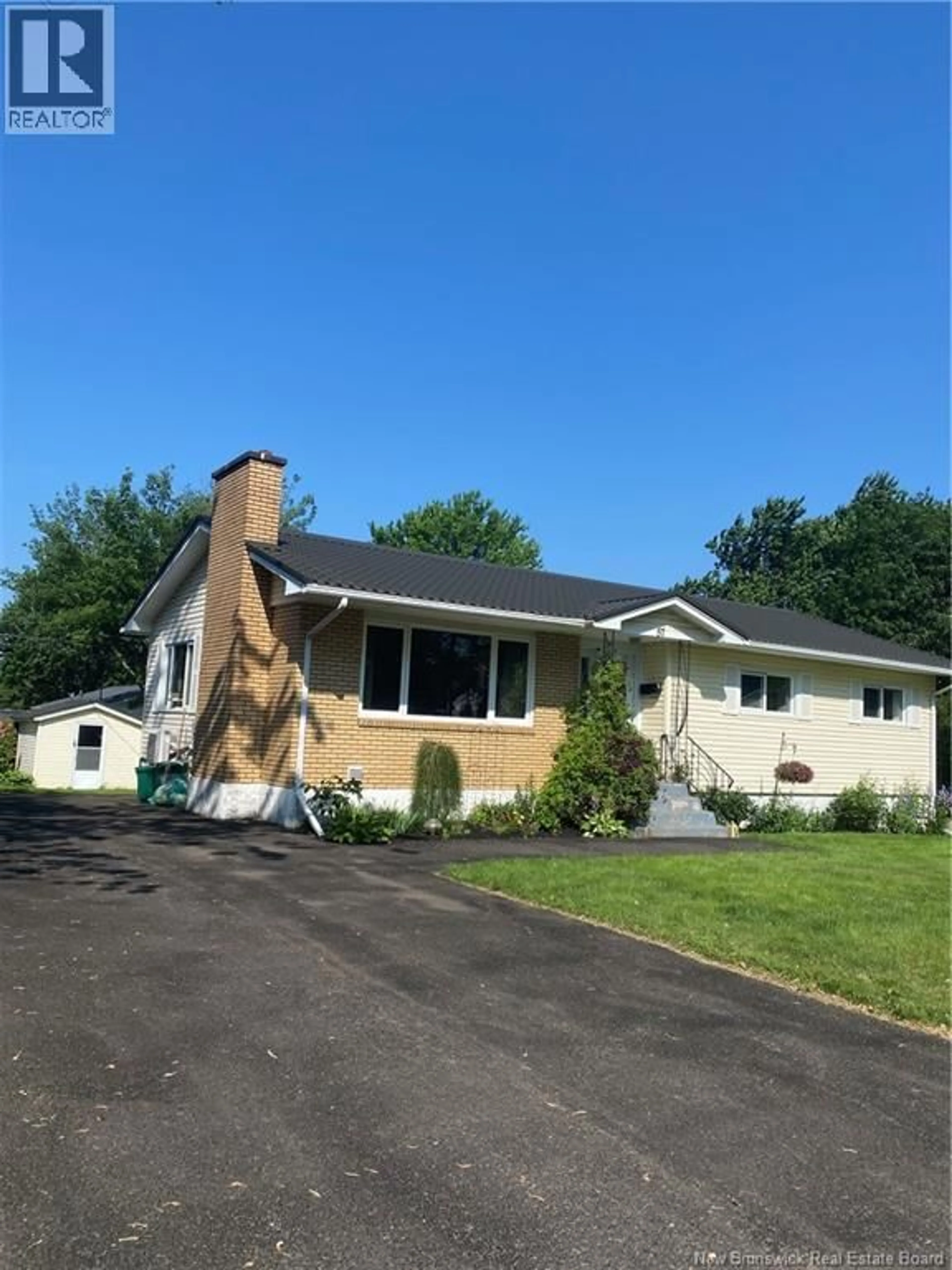 Home with vinyl exterior material, street for 57 WILSON ROAD, Riverview New Brunswick E1B2W3