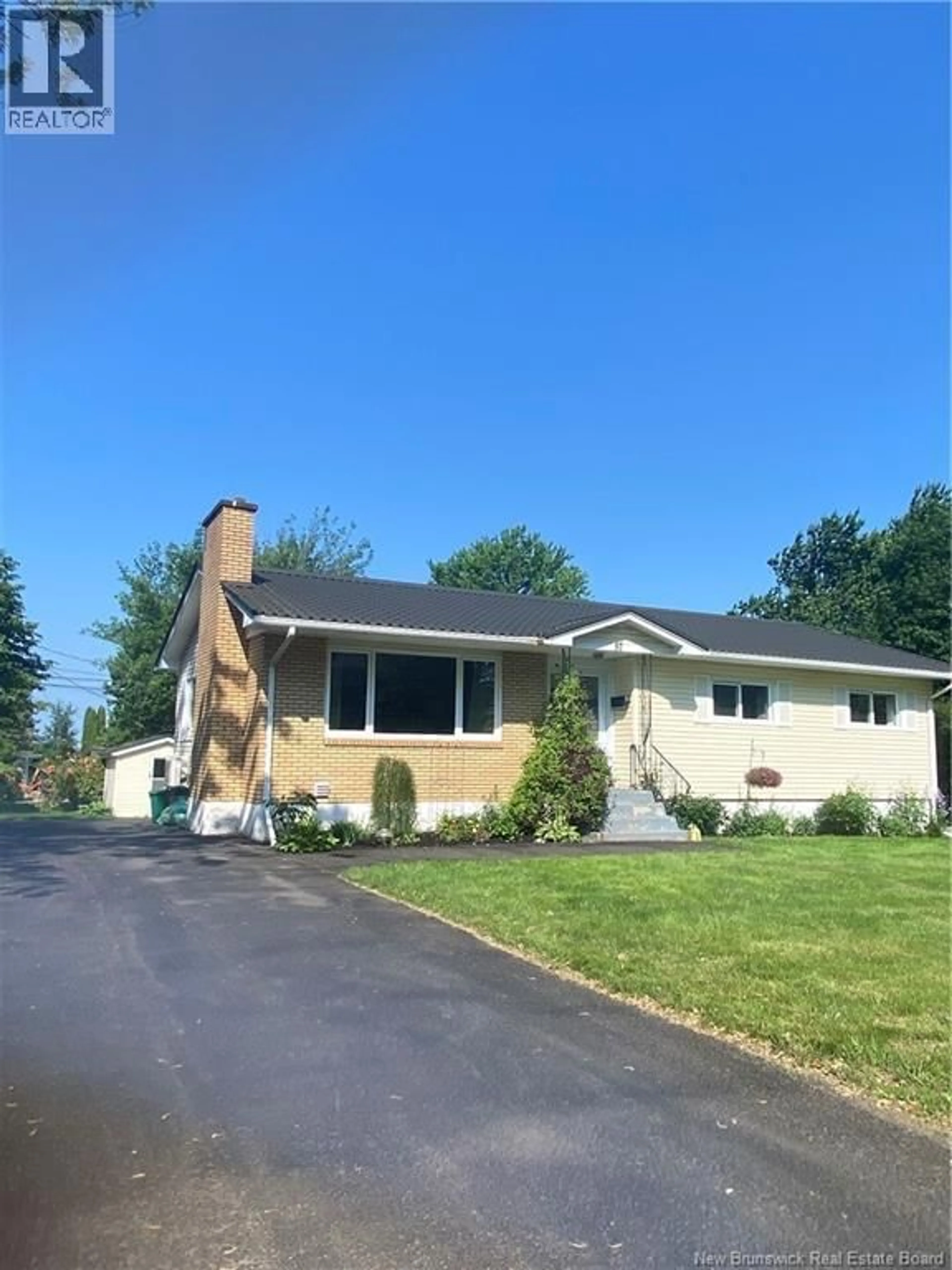Home with vinyl exterior material, street for 57 WILSON ROAD, Riverview New Brunswick E1B2W3