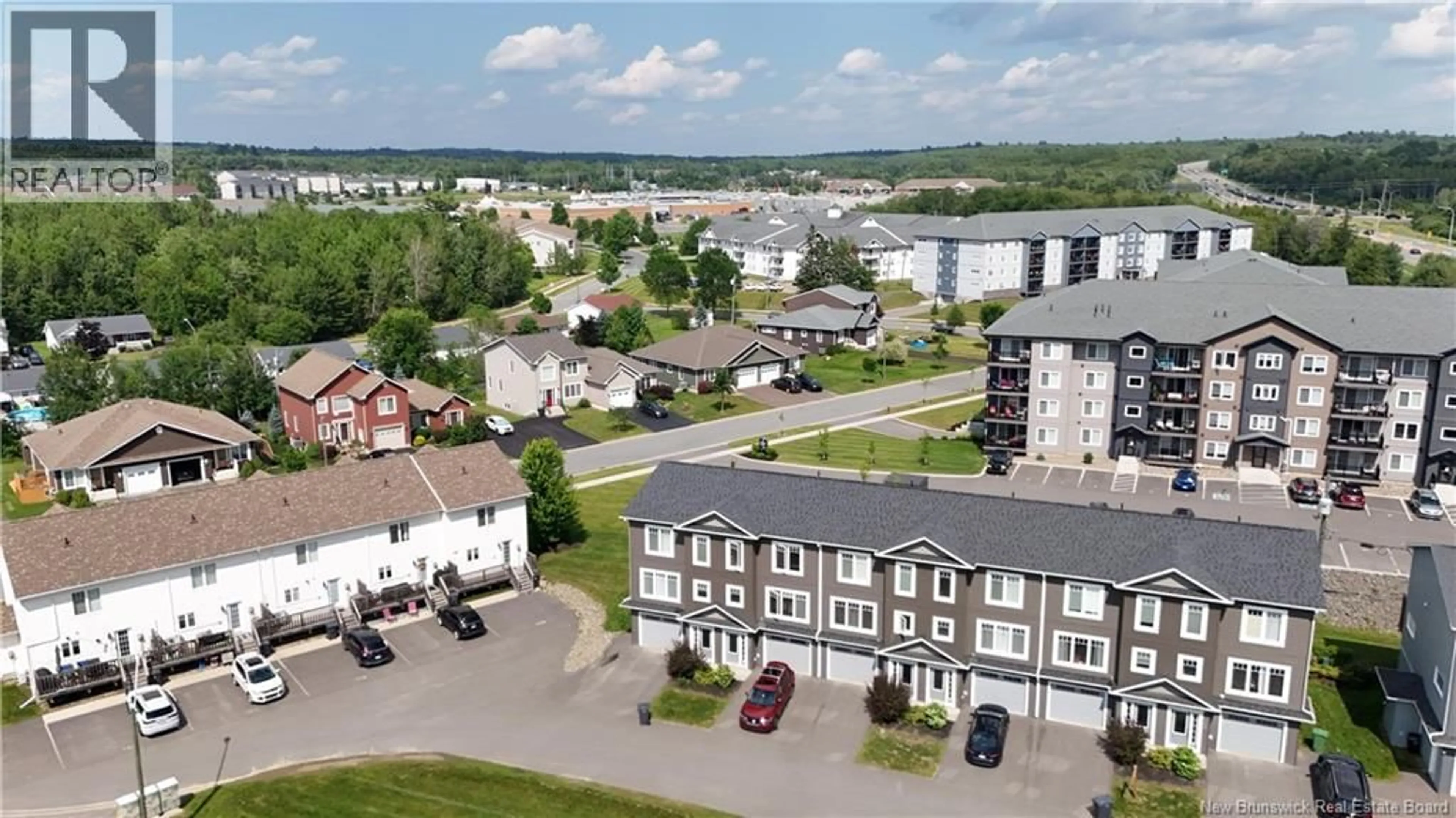A pic from outside/outdoor area/front of a property/back of a property/a pic from drone, unknown for 140 MIA CIRCLE, Fredericton New Brunswick E3A7N5