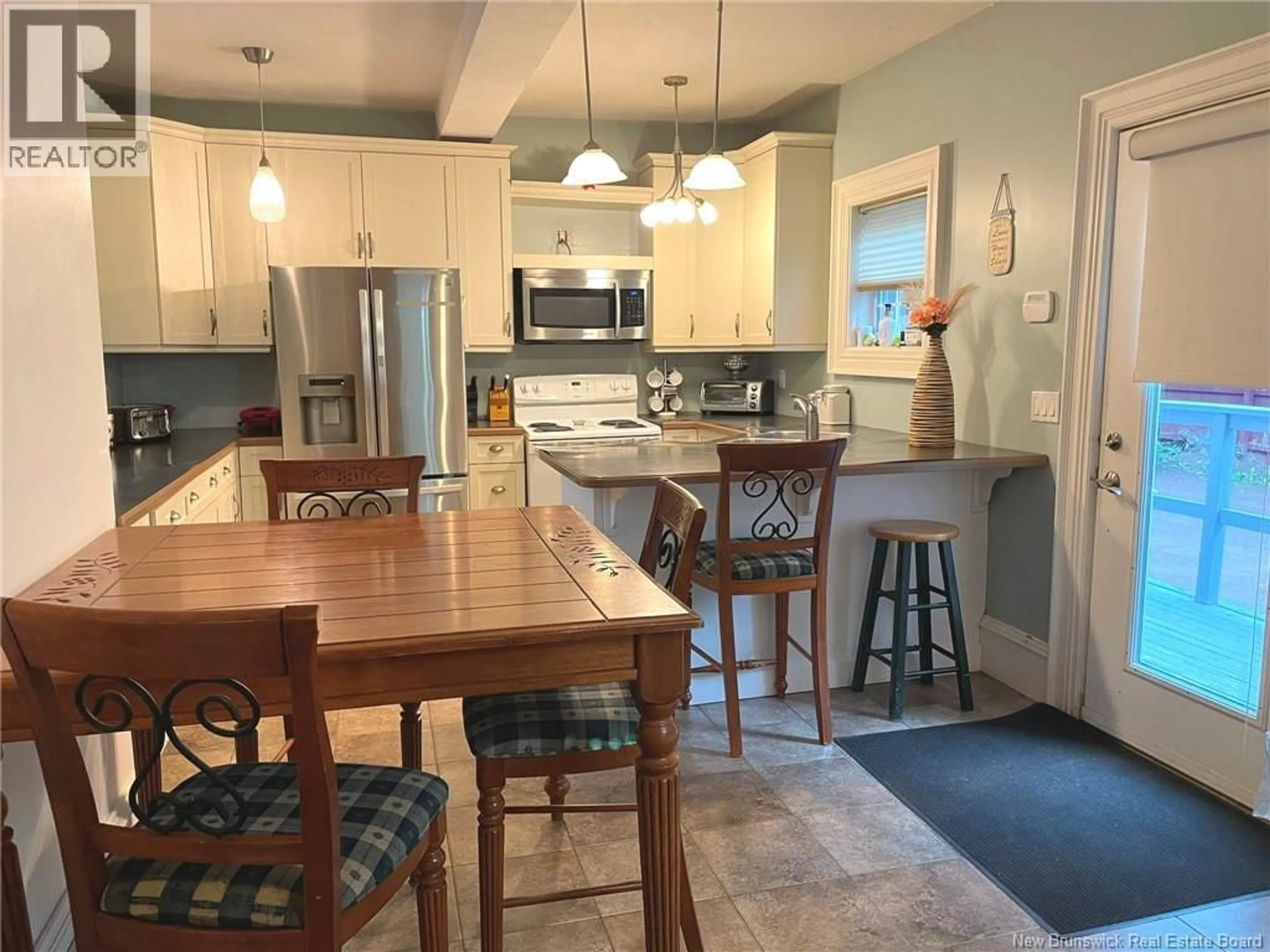 Open concept kitchen, ceramic/tile floor for 105 GORDON STREET, Moncton New Brunswick E1C1M5