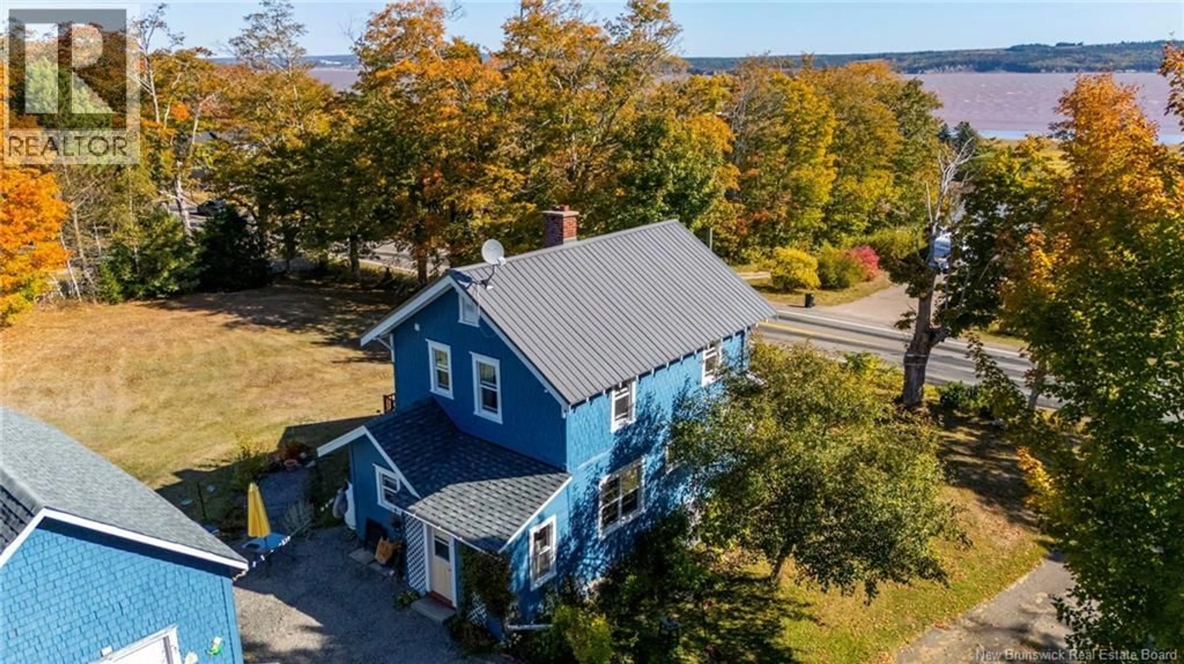 A pic from outside/outdoor area/front of a property/back of a property/a pic from drone, unknown for 3988 ROUTE 114, Hopewell Cape New Brunswick E4H3K1