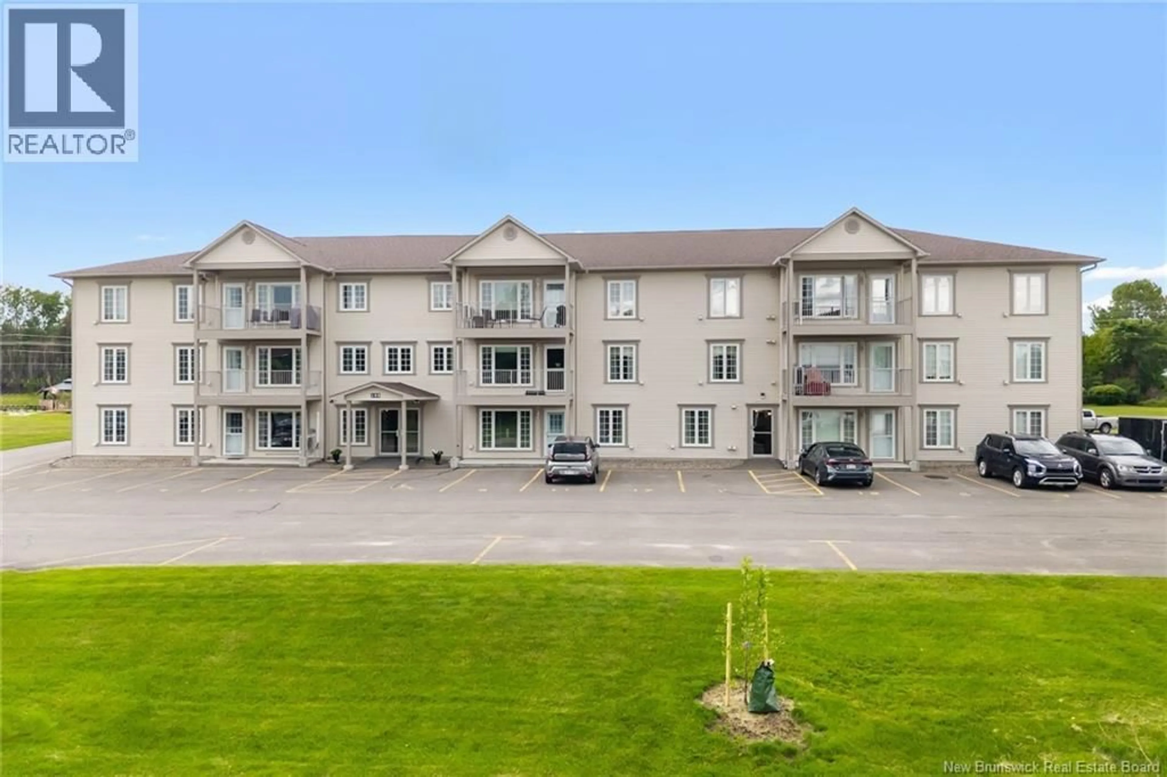 A pic from outside/outdoor area/front of a property/back of a property/a pic from drone, building for 318 - 195 REYNOLDS STREET, Fredericton New Brunswick E3A0S5