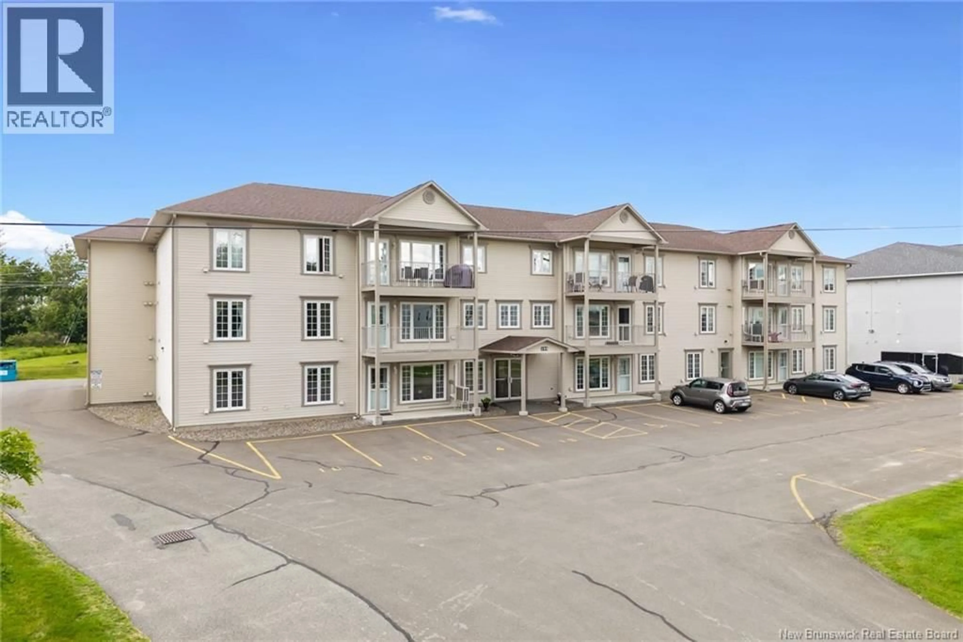 A pic from outside/outdoor area/front of a property/back of a property/a pic from drone, building for 318 - 195 REYNOLDS STREET, Fredericton New Brunswick E3A0S5