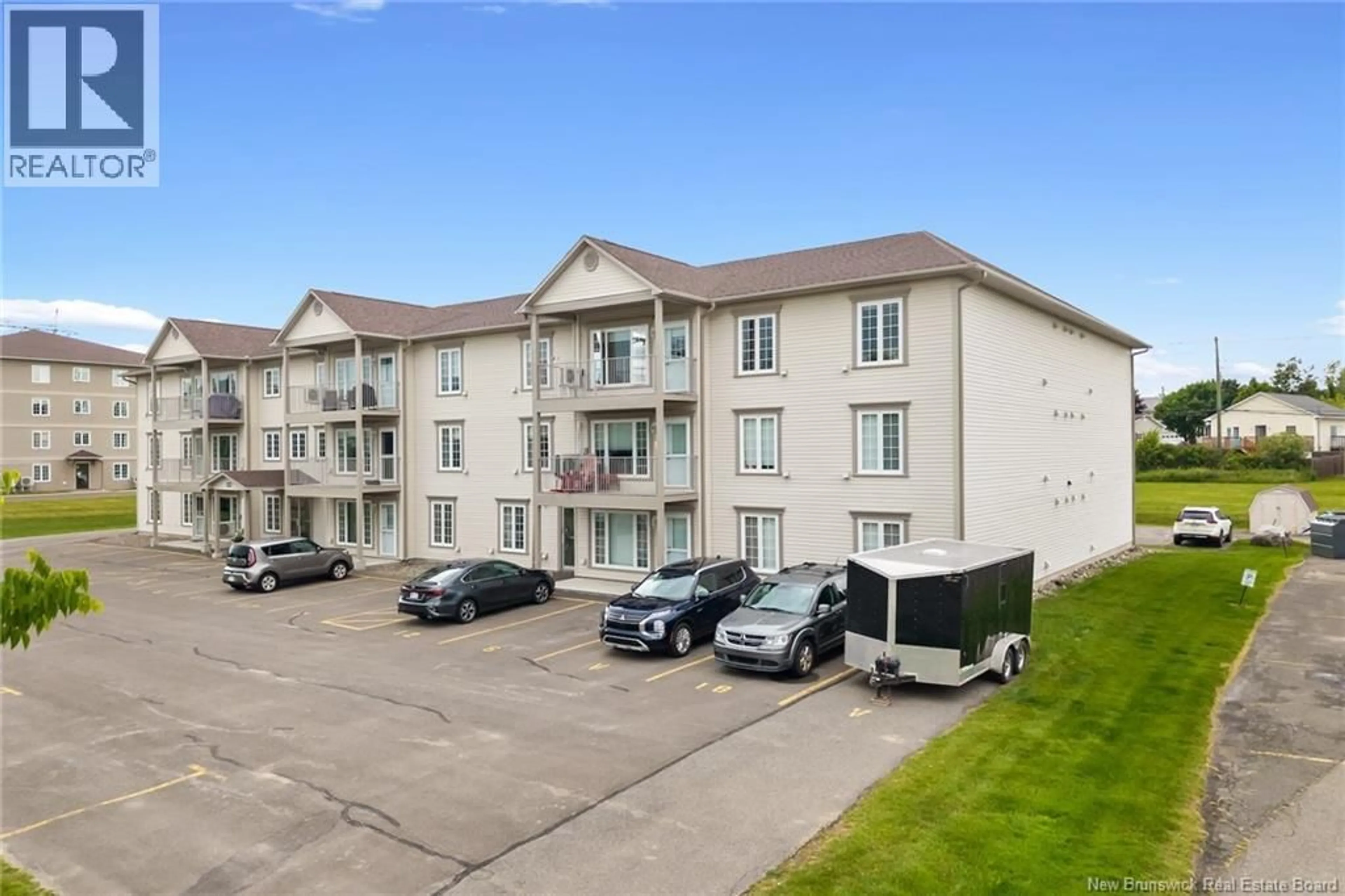 A pic from outside/outdoor area/front of a property/back of a property/a pic from drone, building for 318 - 195 REYNOLDS STREET, Fredericton New Brunswick E3A0S5