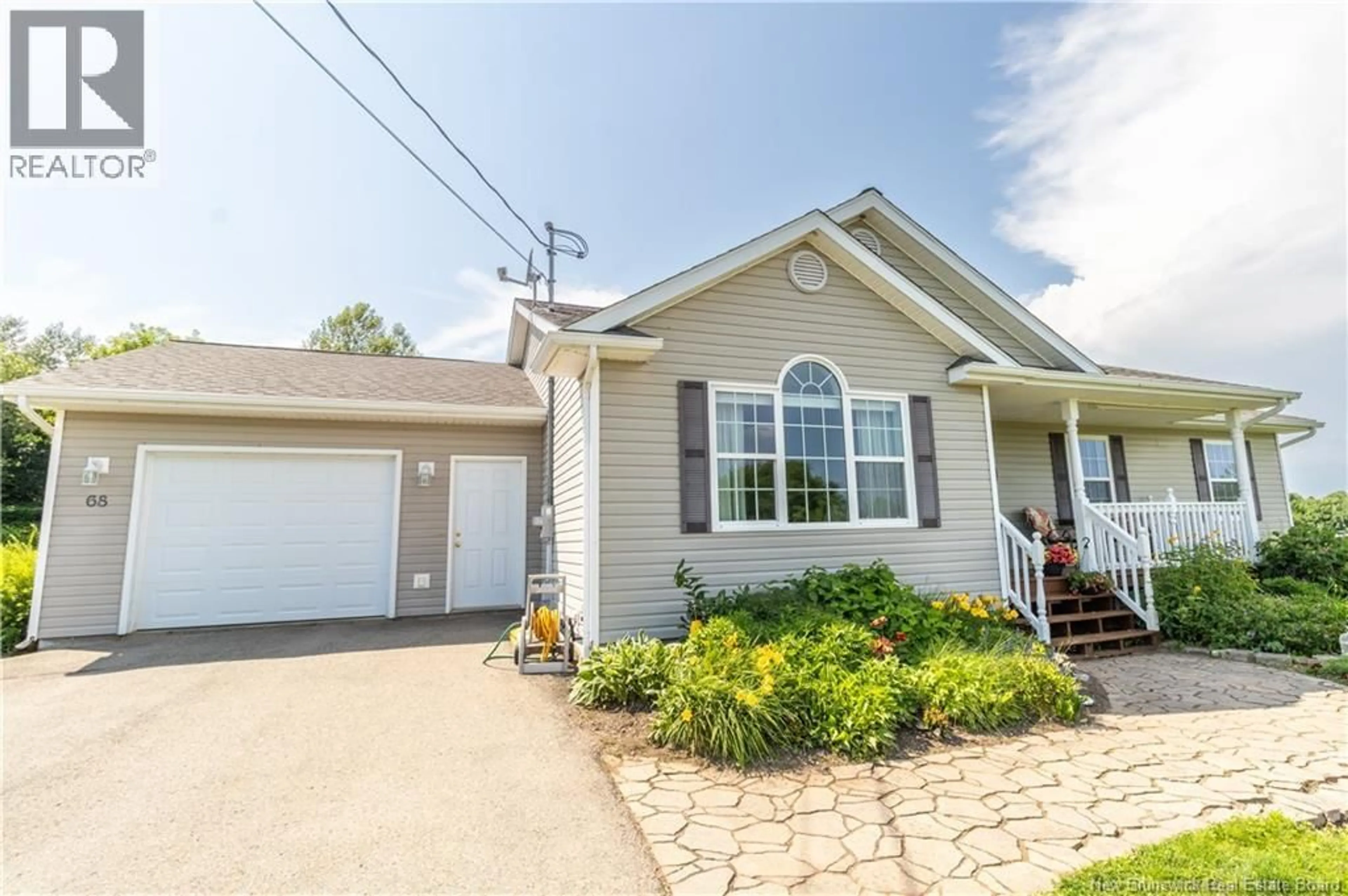 Home with vinyl exterior material, street for 68 LEO AVENUE, Sussex New Brunswick E4E1Z8
