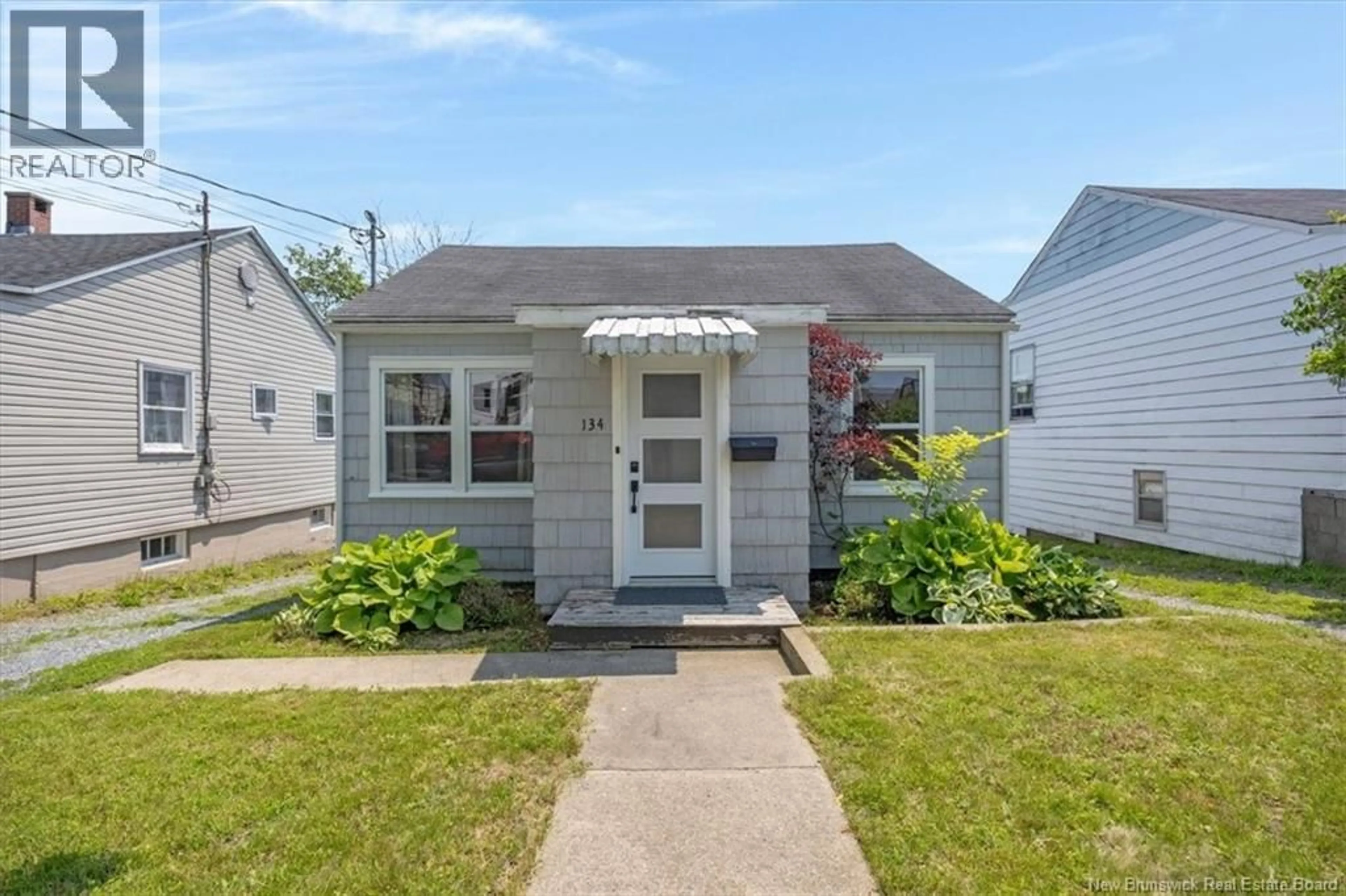 Home with vinyl exterior material, street for 134 COURTENAY AVENUE, Saint John New Brunswick E2J1N5